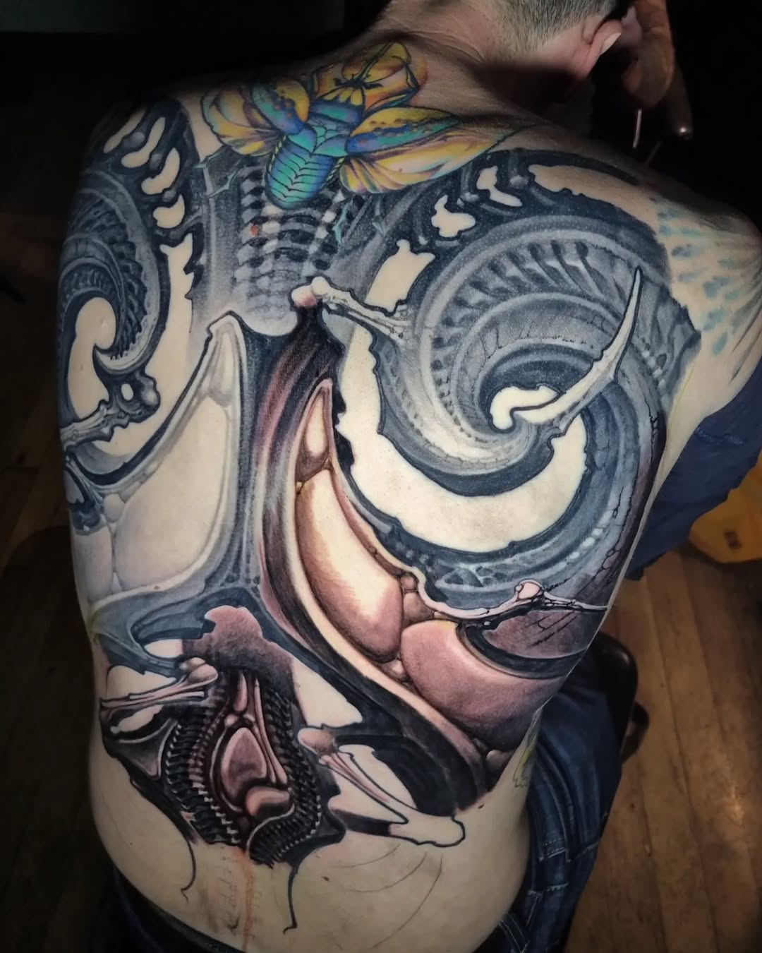 Bio-organic tattoo work by Kali