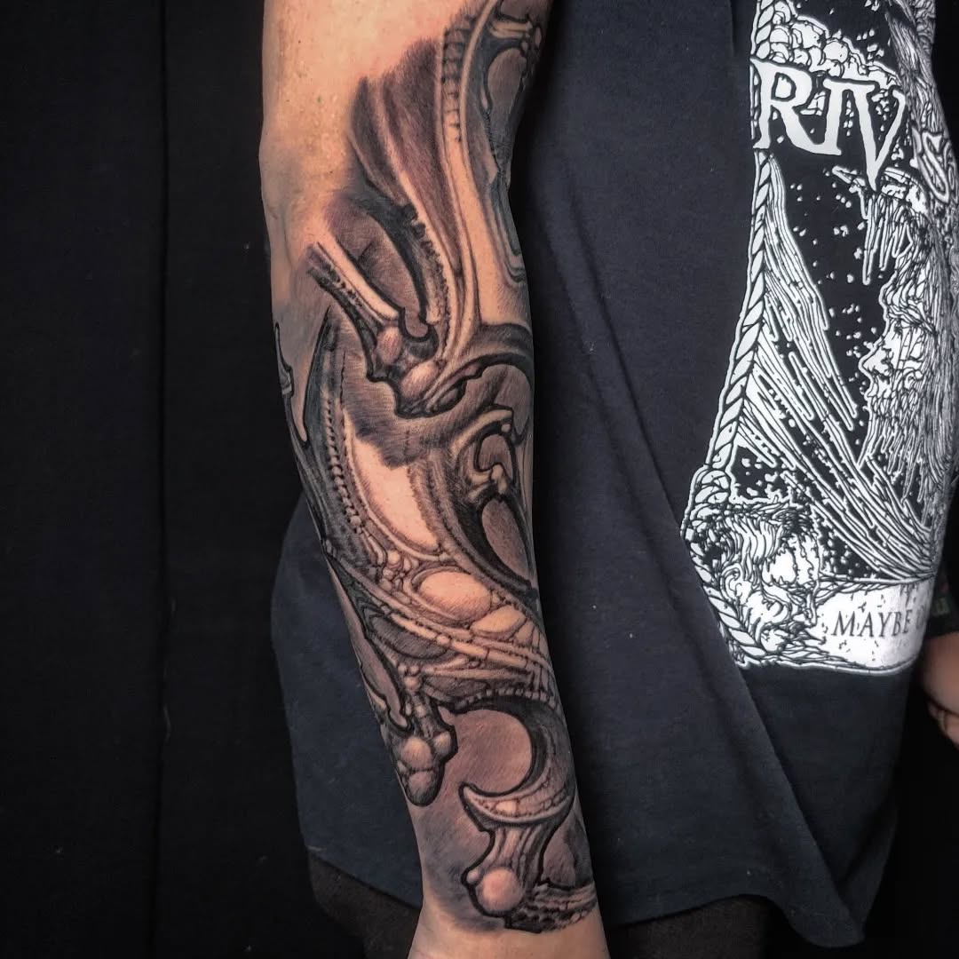 Bio-organic tattoo work by Kali
