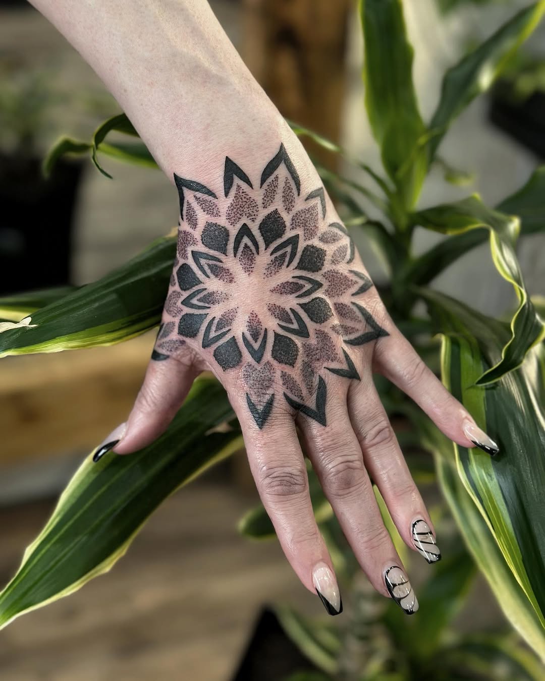 Geometric tattoo by Giada