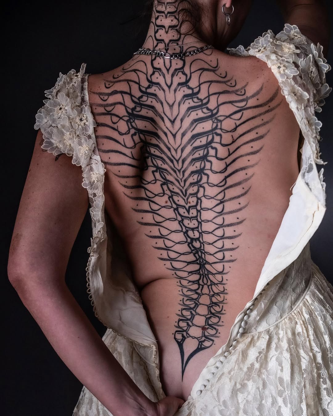 Geometric tattoo by Dana Sha