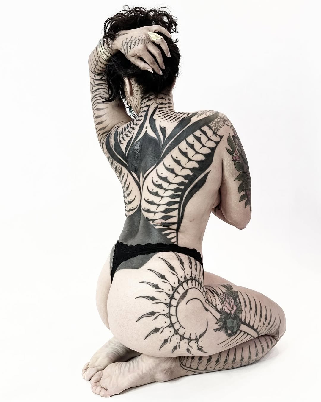 Geometric tattoo by Dana Sha