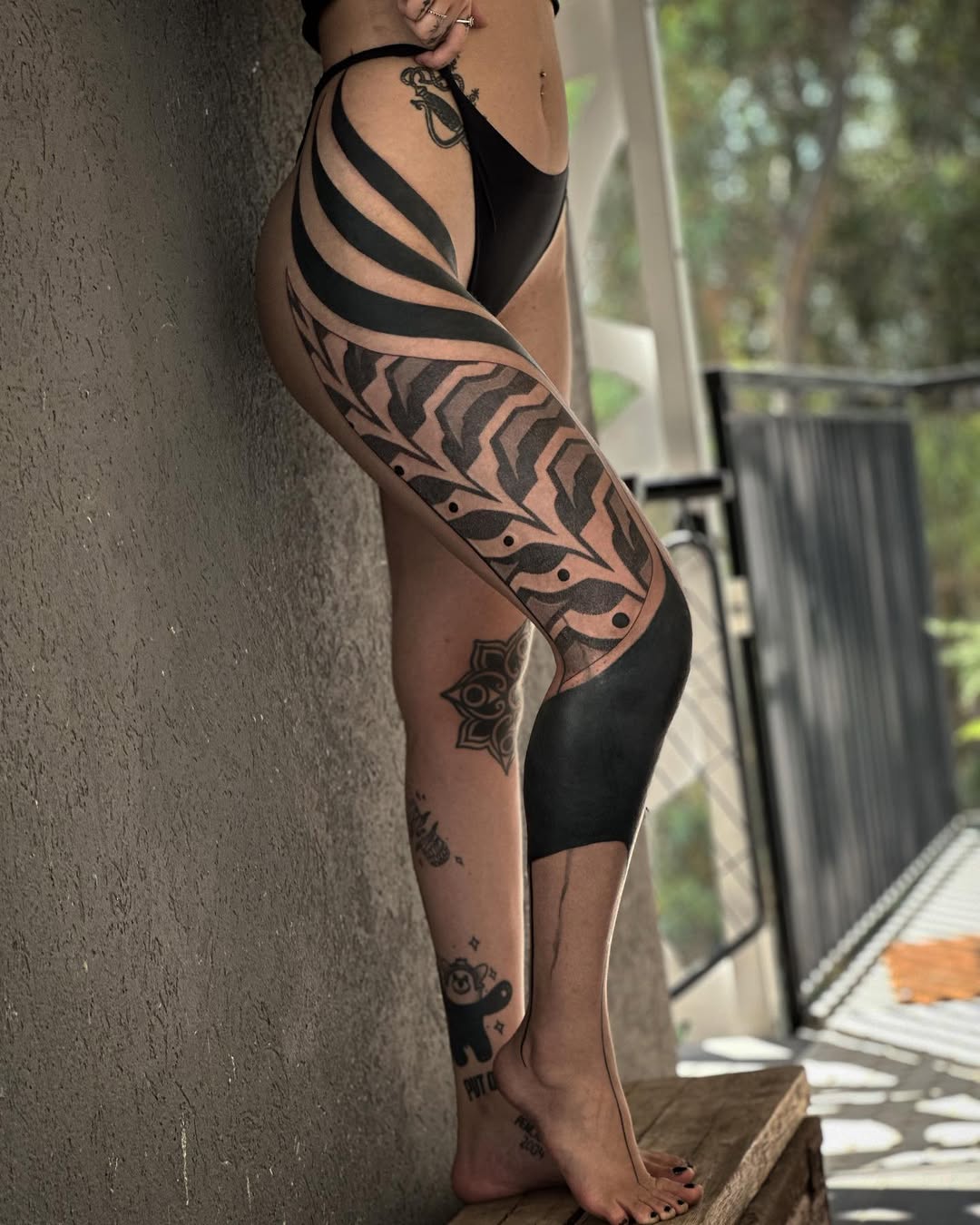 Geometric tattoo by Dana Sha