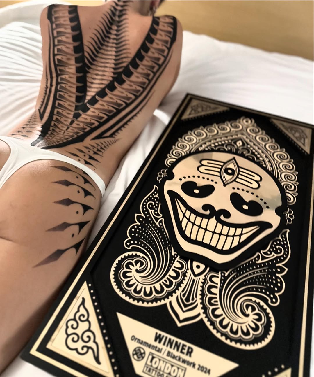 Geometric tattoo by Dana Sha
