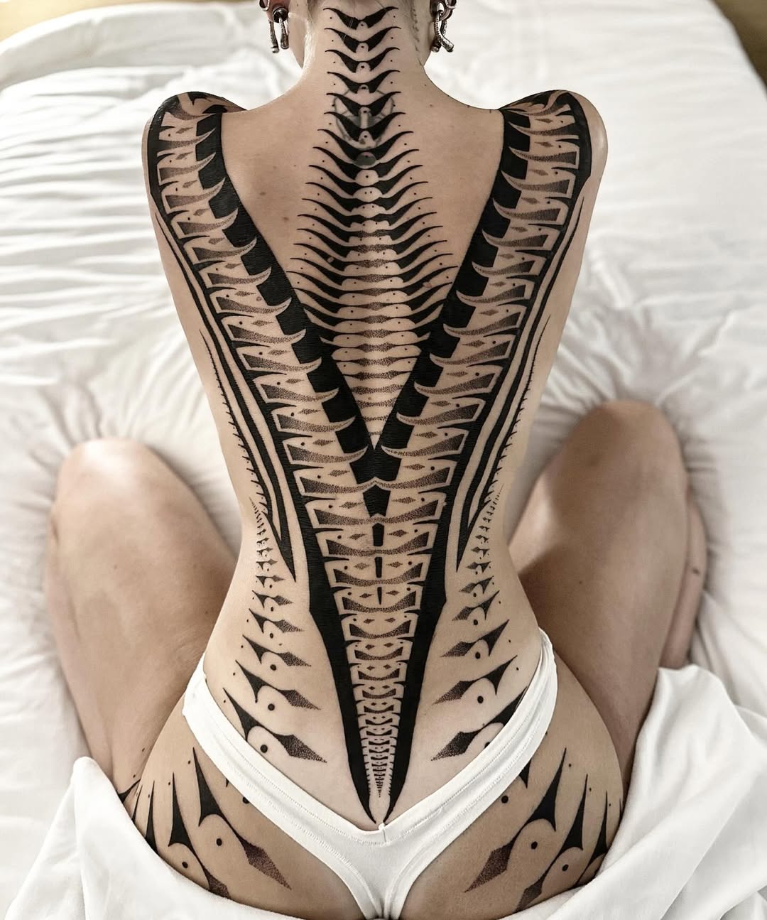 Geometric tattoo by Dana Sha