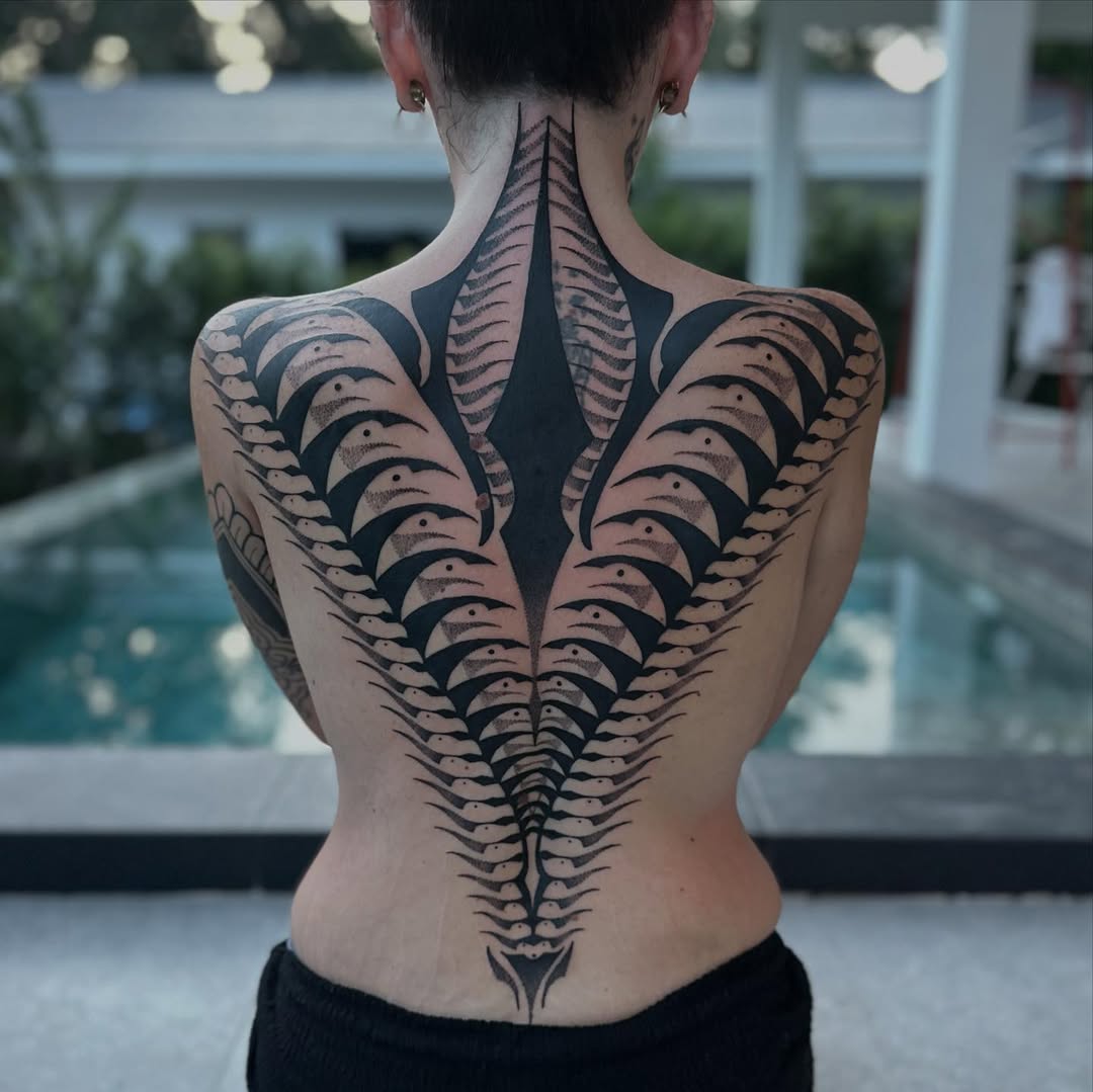 Geometric tattoo by Dana Sha