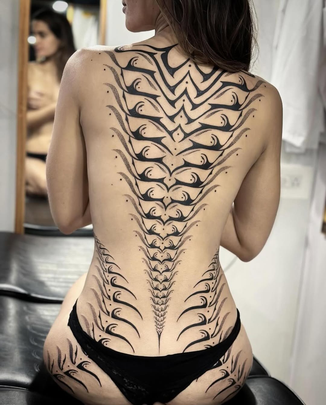 Geometric tattoo by Dana Sha