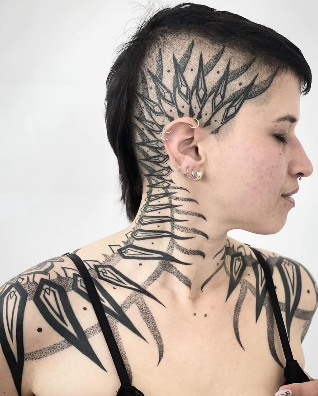 Geometric tattoo by Dana Sha