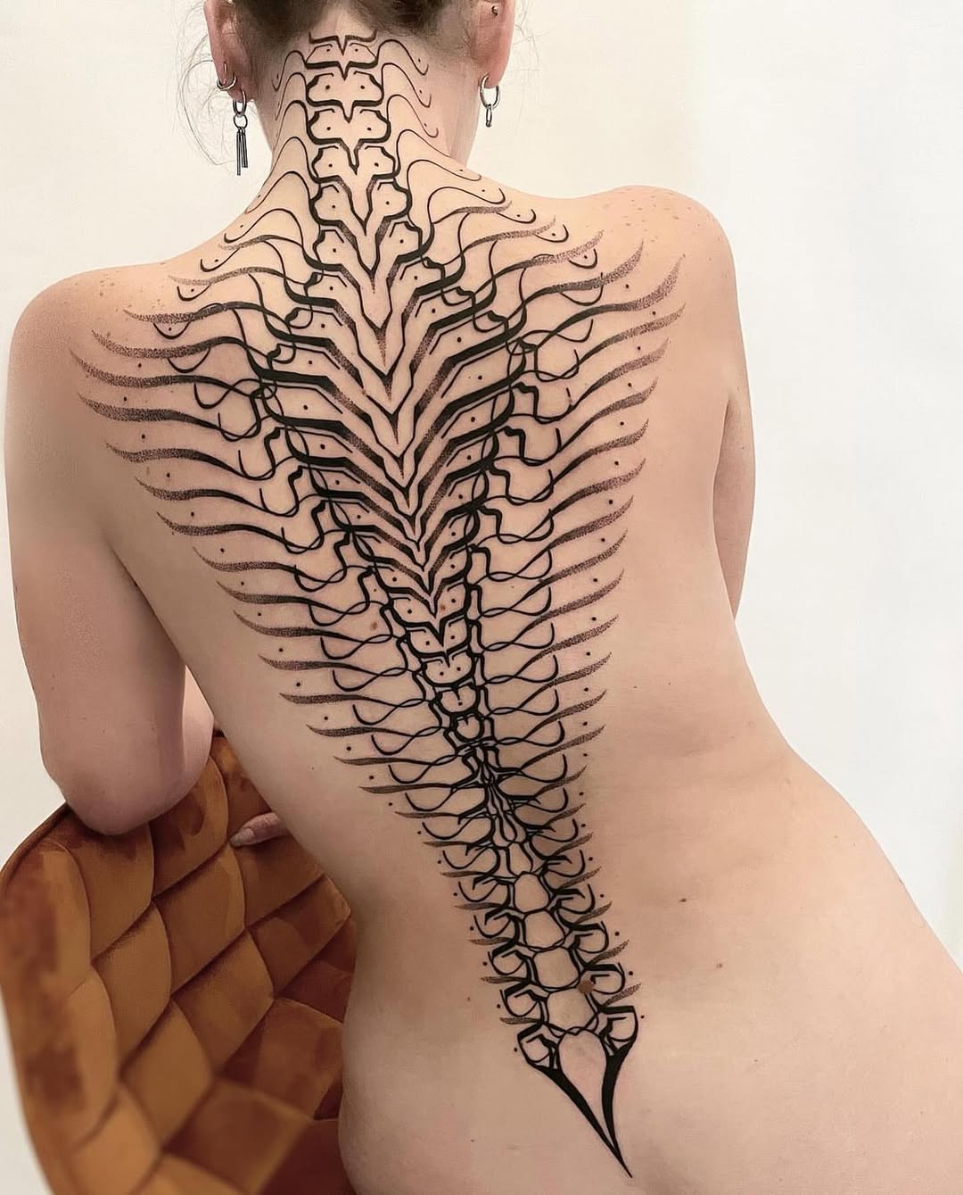 Geometric tattoo by Dana Sha