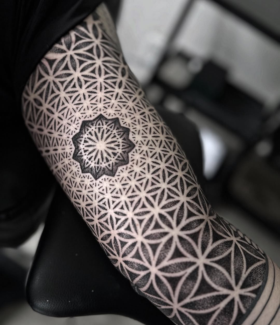 Geometric tattoo by Dana Sha