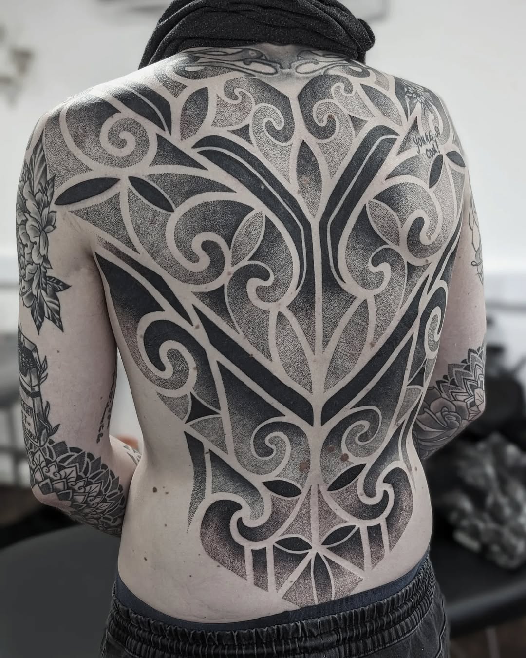 Geometric tattoo by Jessi James