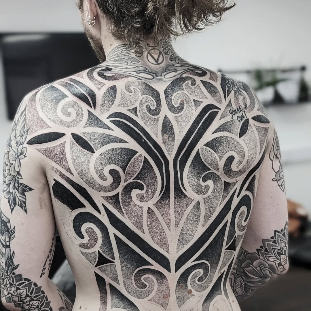 Geometric tattoo by Jessi James