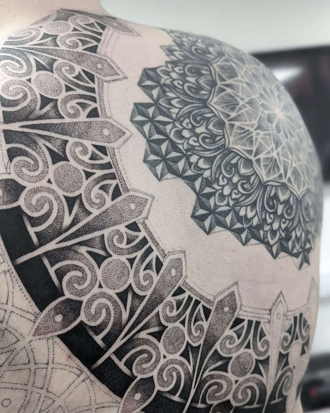 Geometric tattoo by Jessi James
