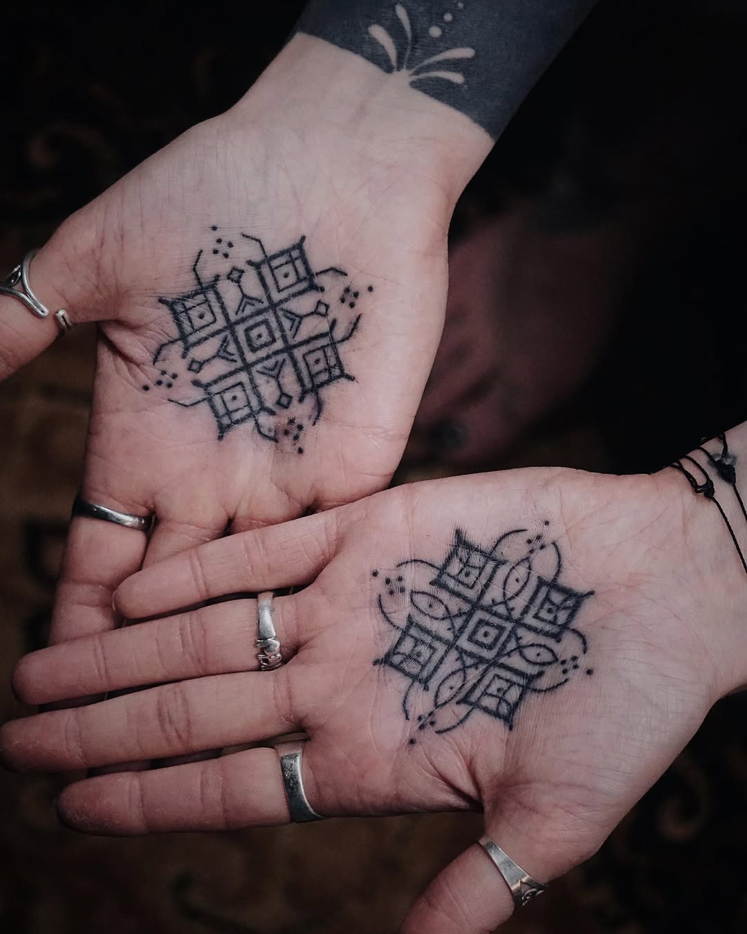 Hand poke tattoo by Arne