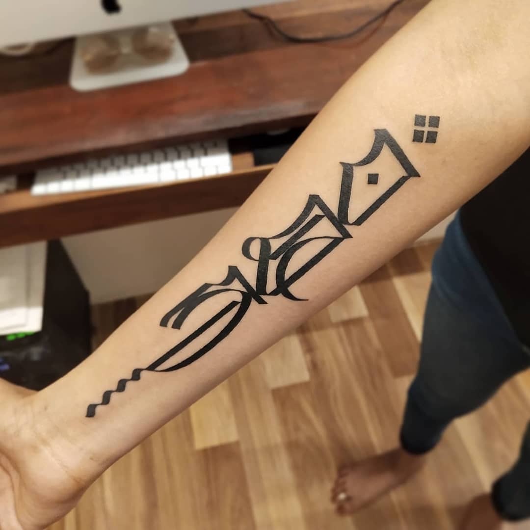 Typography tattoo by Manish Kadam