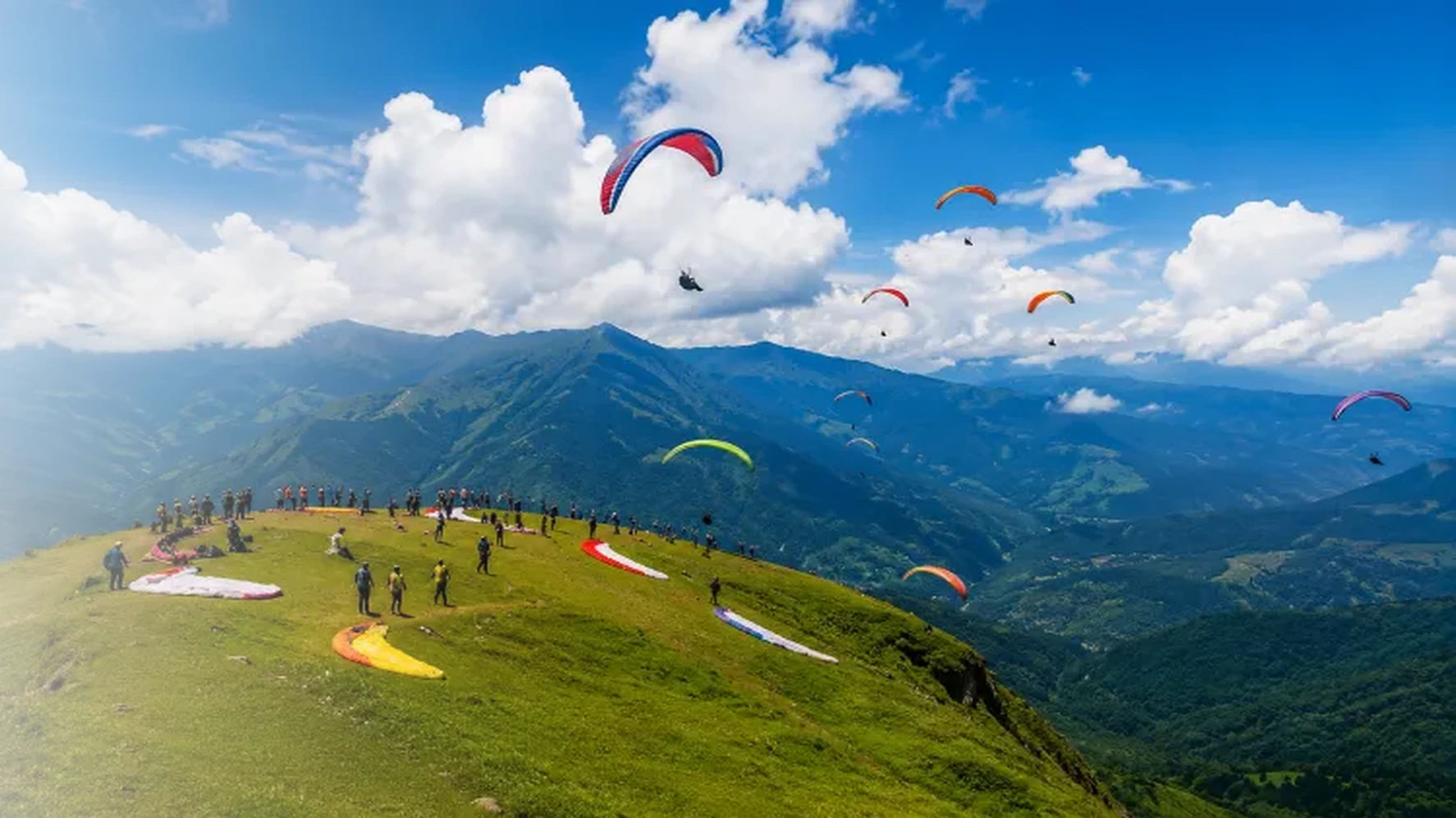 Paragliding over the Himalayan landscape of Bir Billing, Himachal Pradesh