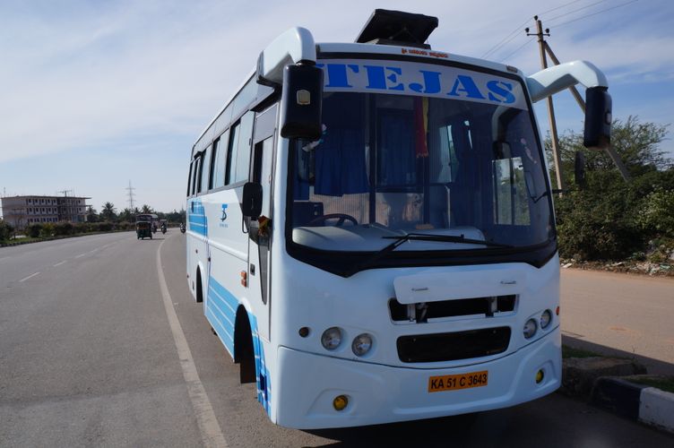 Separate vehicle types for large groups are transferred to Bangalore Airport.