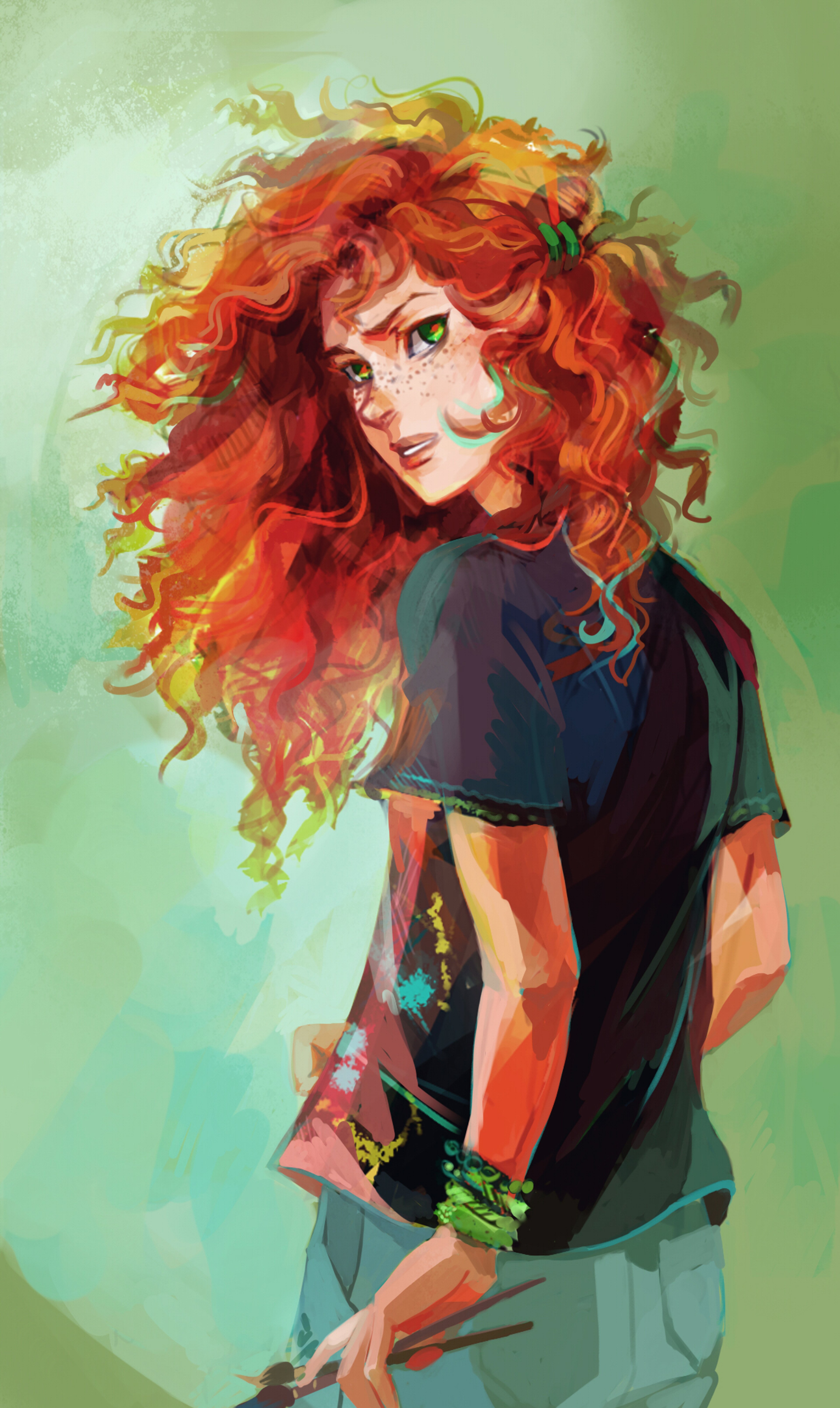 A young woman with red curly hair and green eyes wearing a black t-shirt