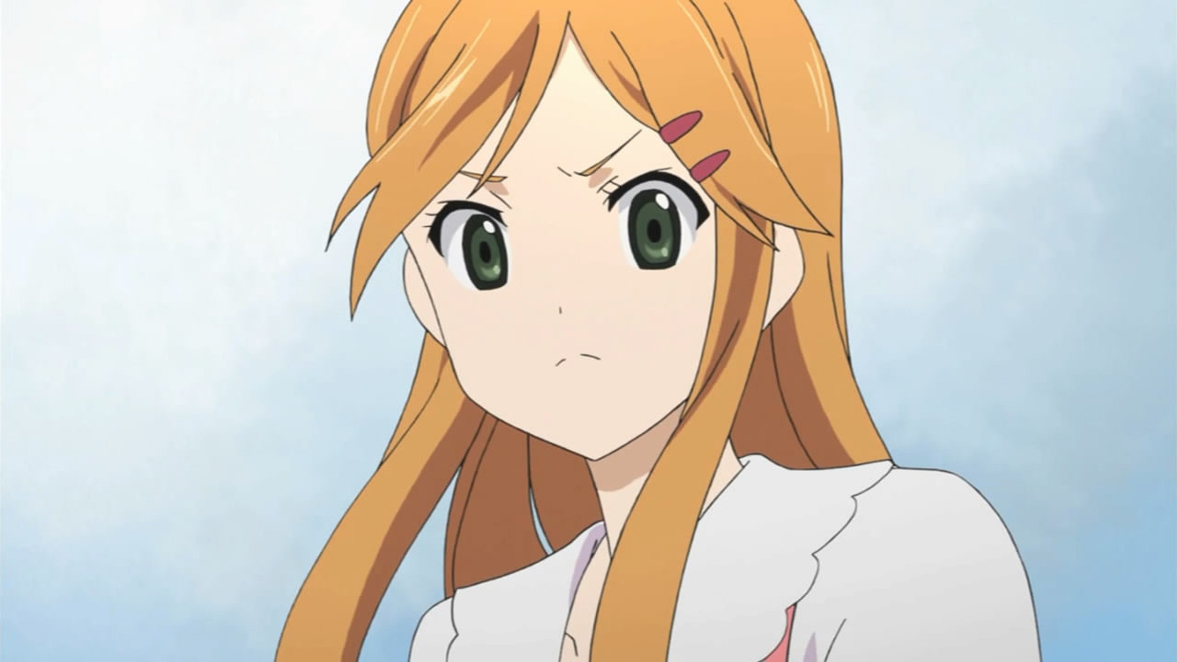 A young woman with strawberry-blonde hair and green eyes wearing a white school uniform