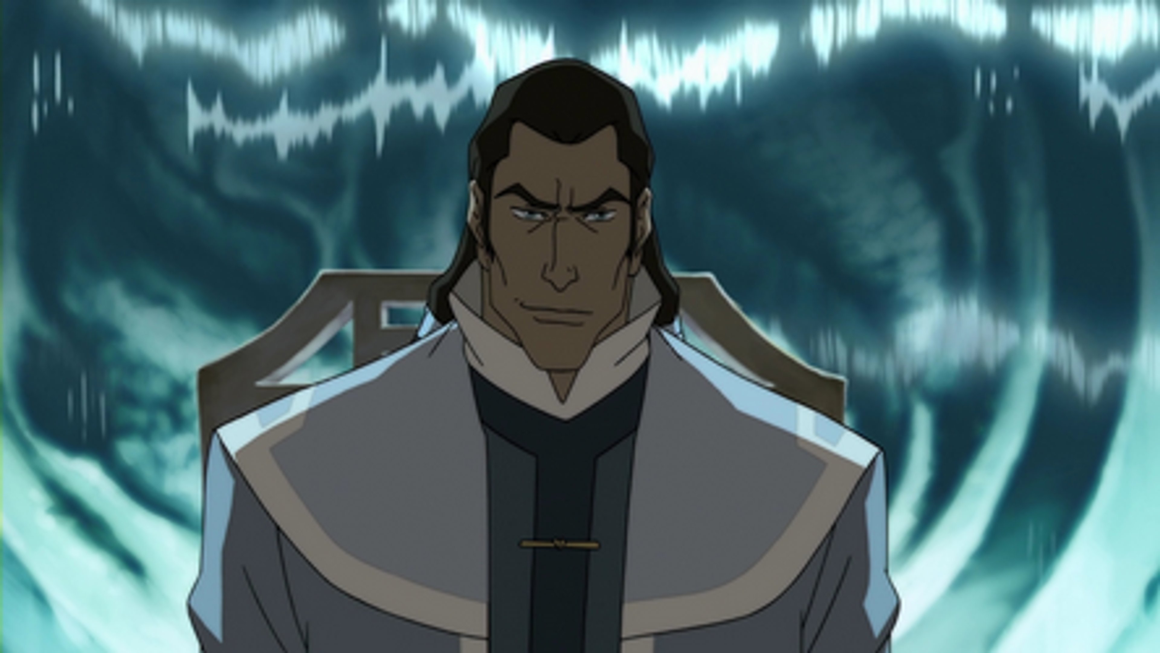 A serious-looking man in a gray and black outfit against a stormy background