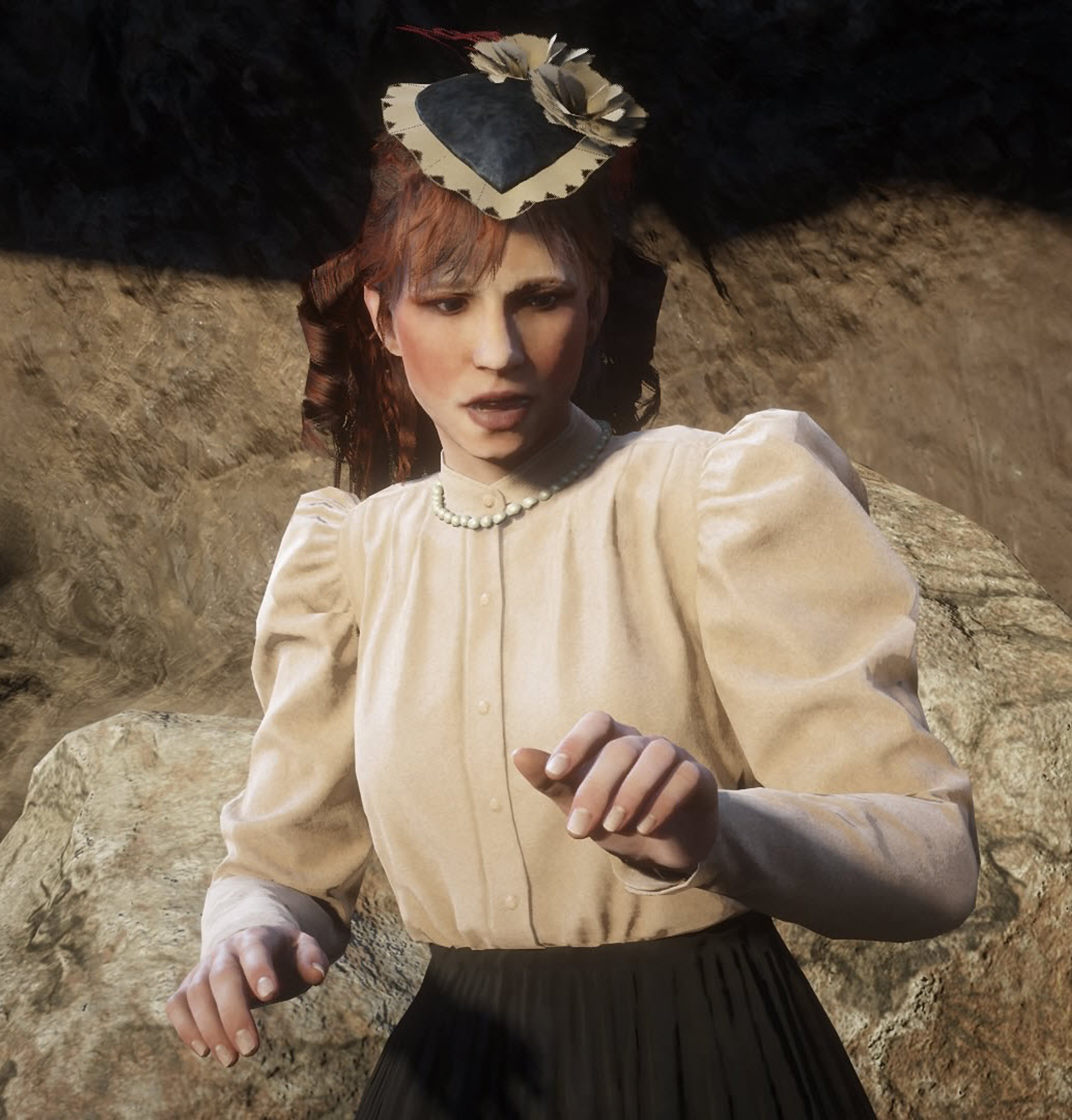 A young woman with dark hair and a serious expression, standing in a field or meadow.