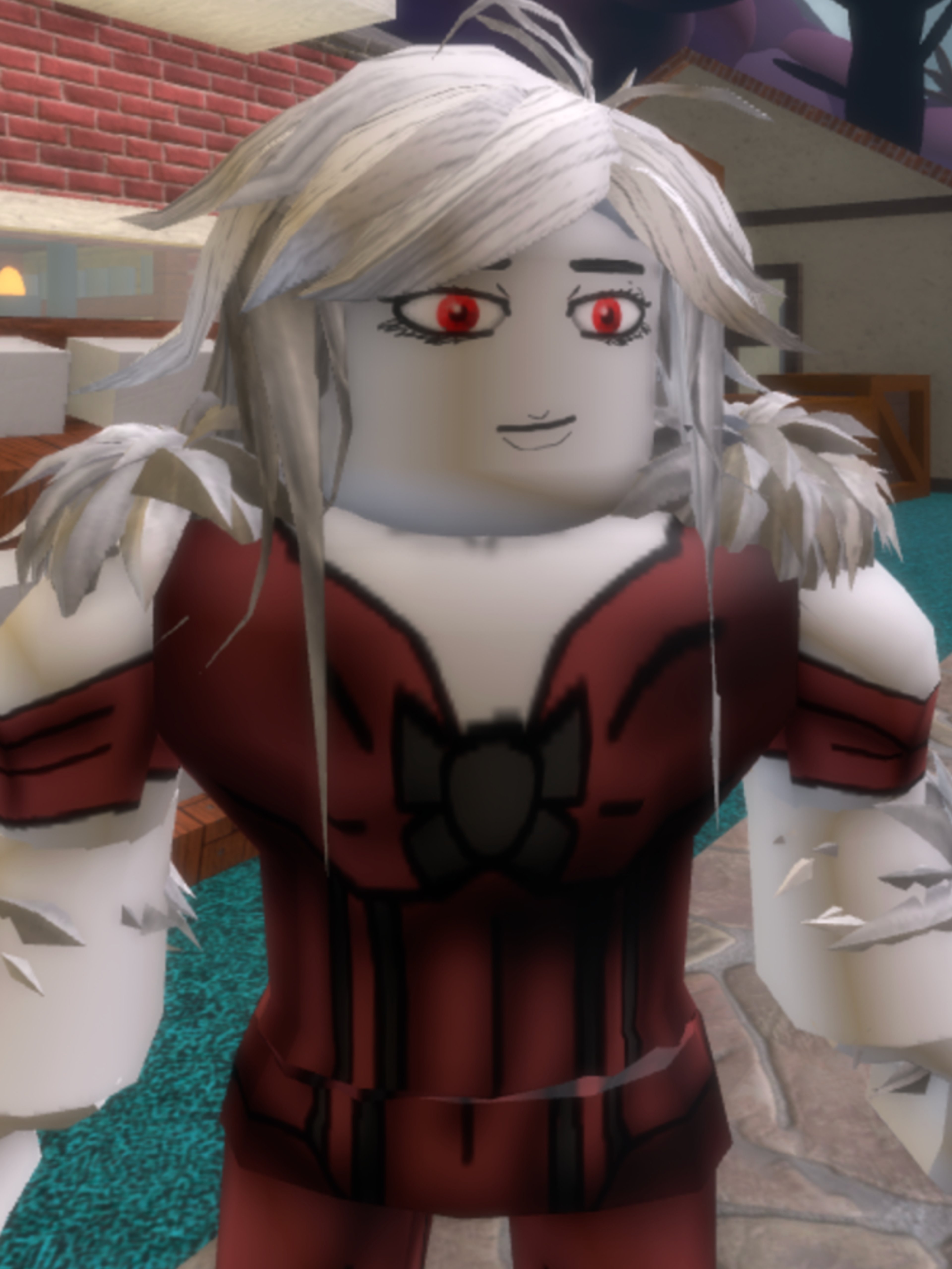 A pale-skinned woman with white hair and blue fur covering her body