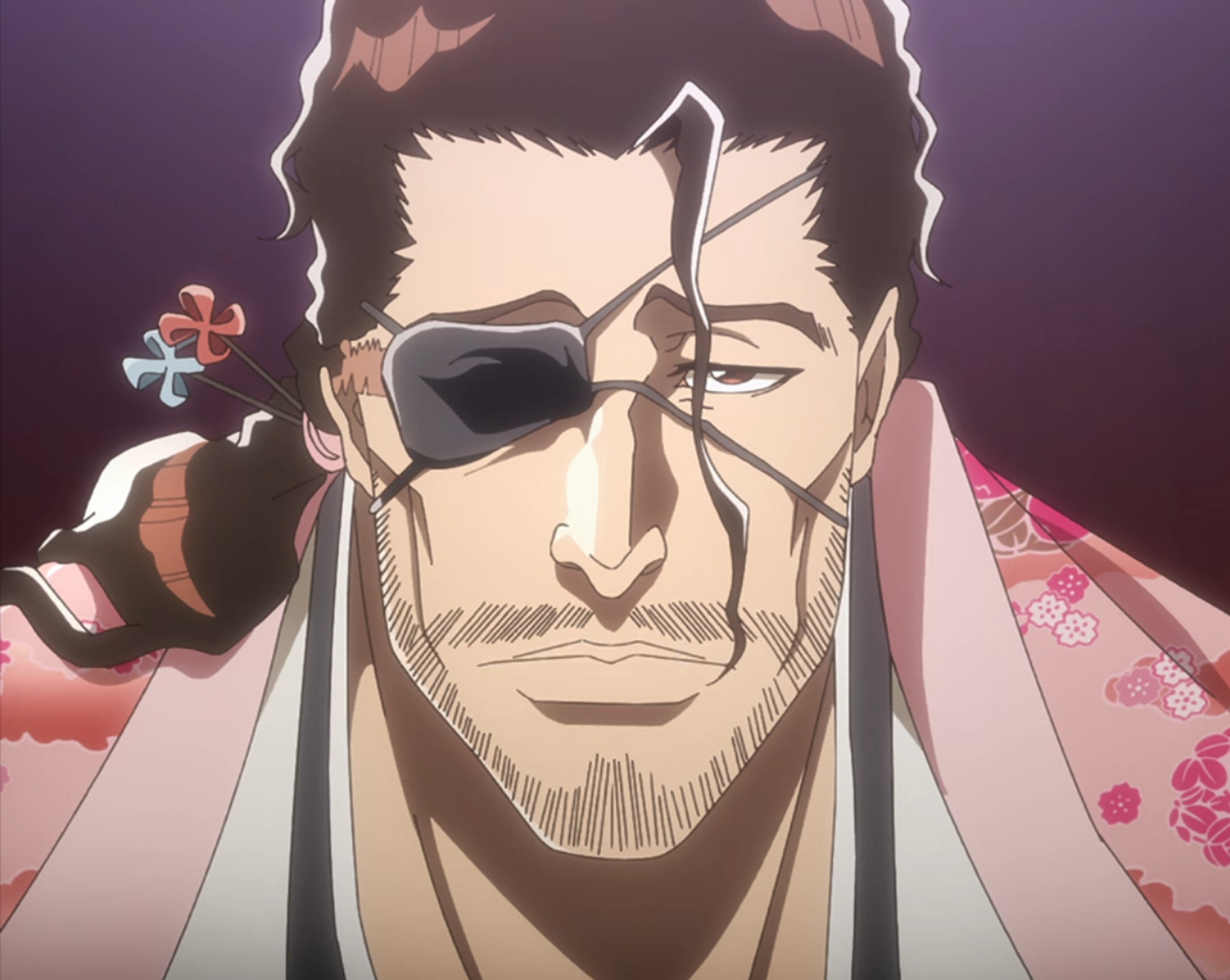 A Shinigami character with long brown hair, a pink flowered kimono, and a laid-back demeanor.