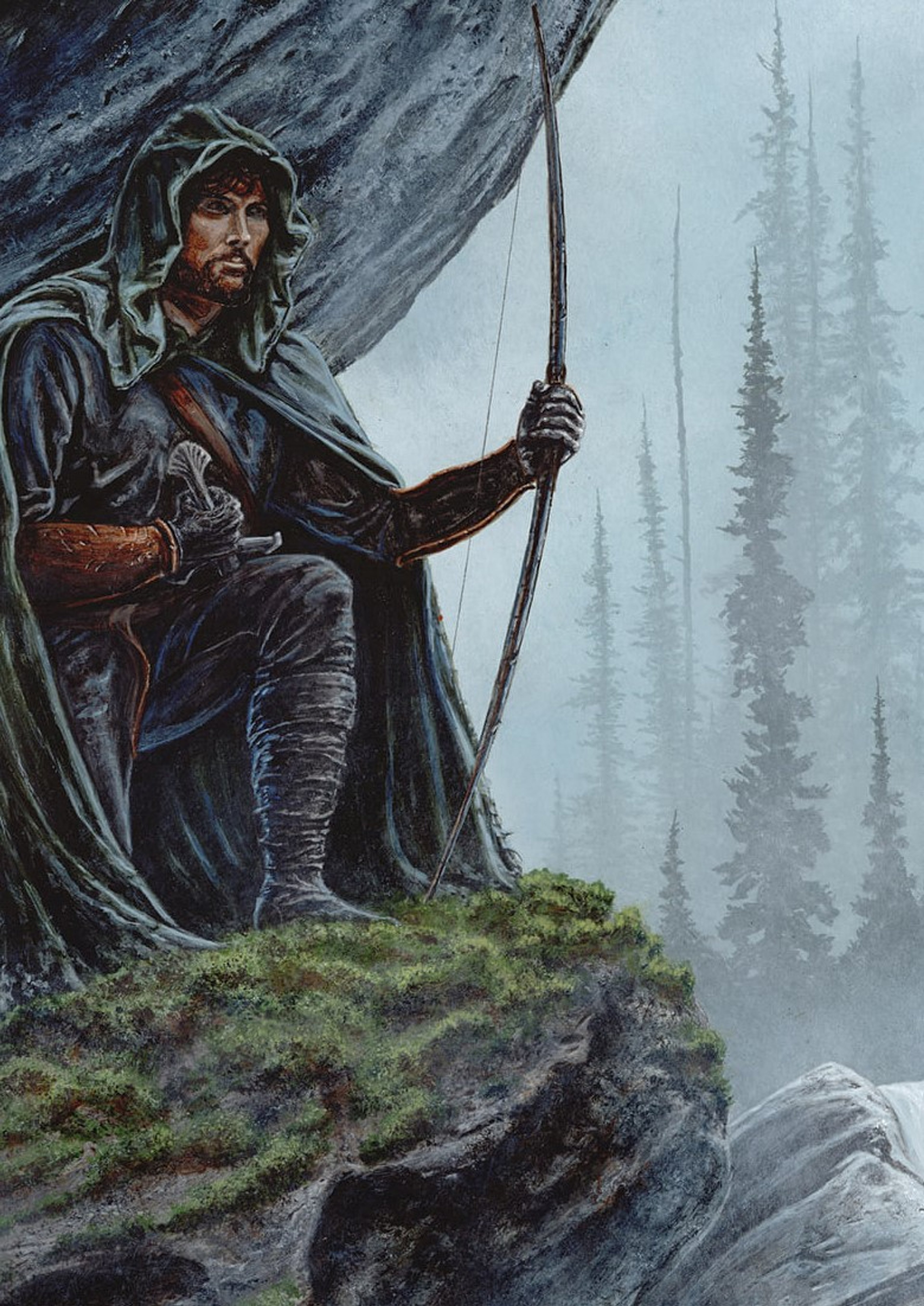 A man in a hooded cloak standing on a rocky outcrop overlooking a misty forest, holding a sword.