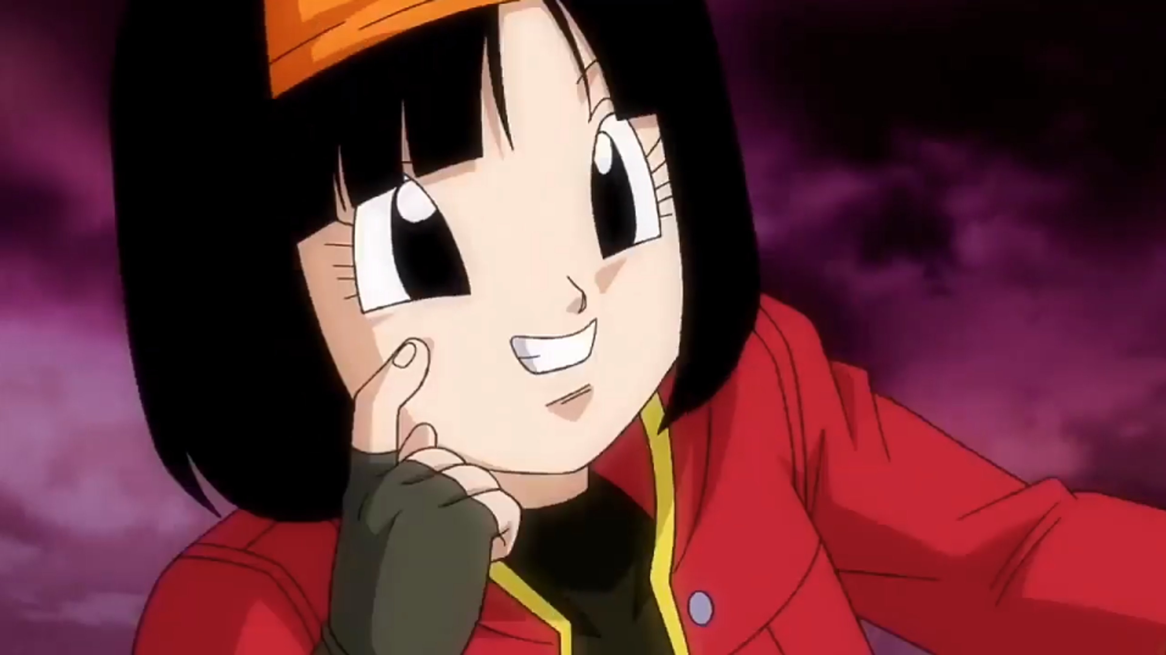 An anime-style character with short black hair, a red jacket, black crop top, and green shorts.