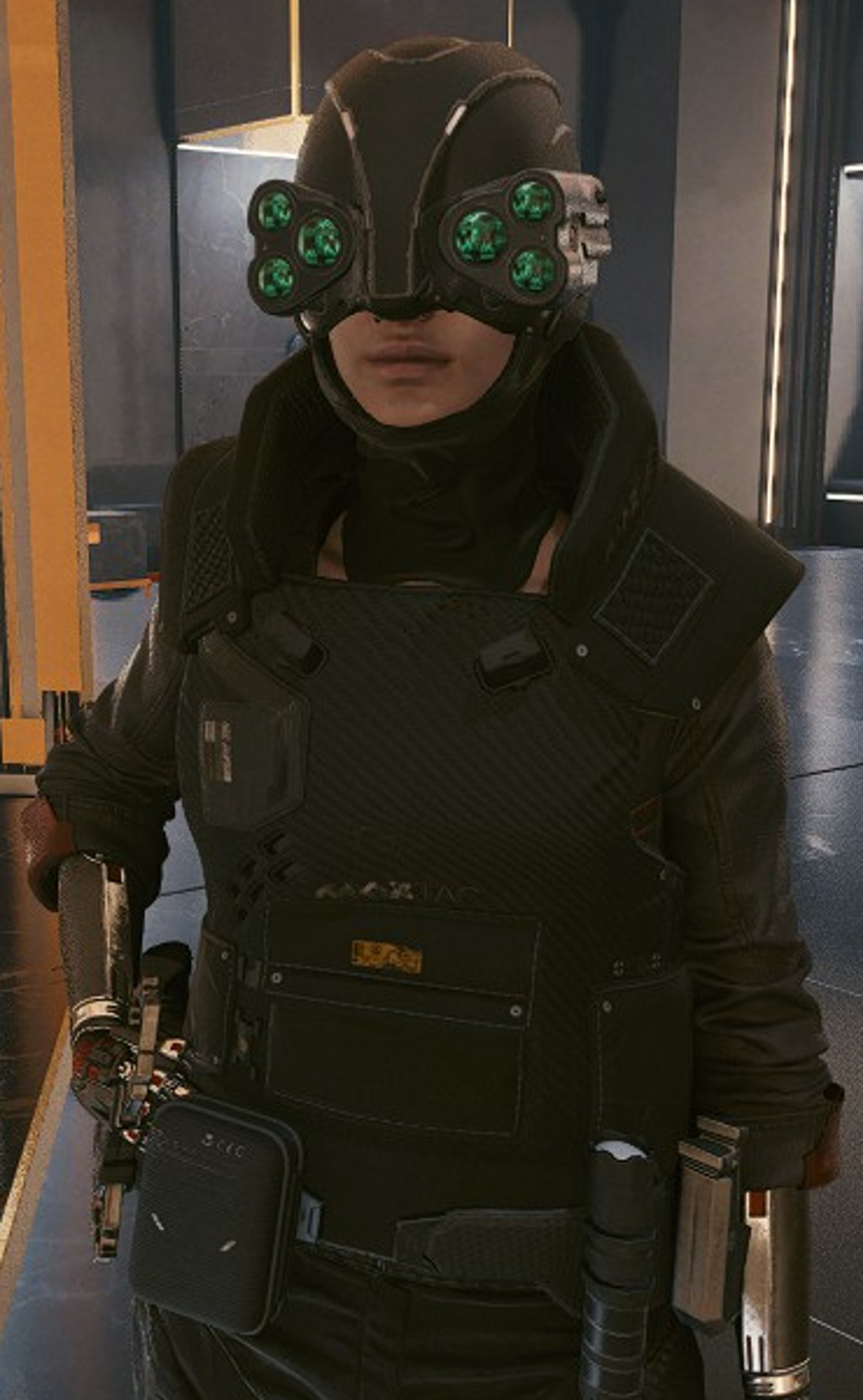 A person in a dark green military-style outfit with a cyberpunk-style mask covering their face, holding a weapon or tool.