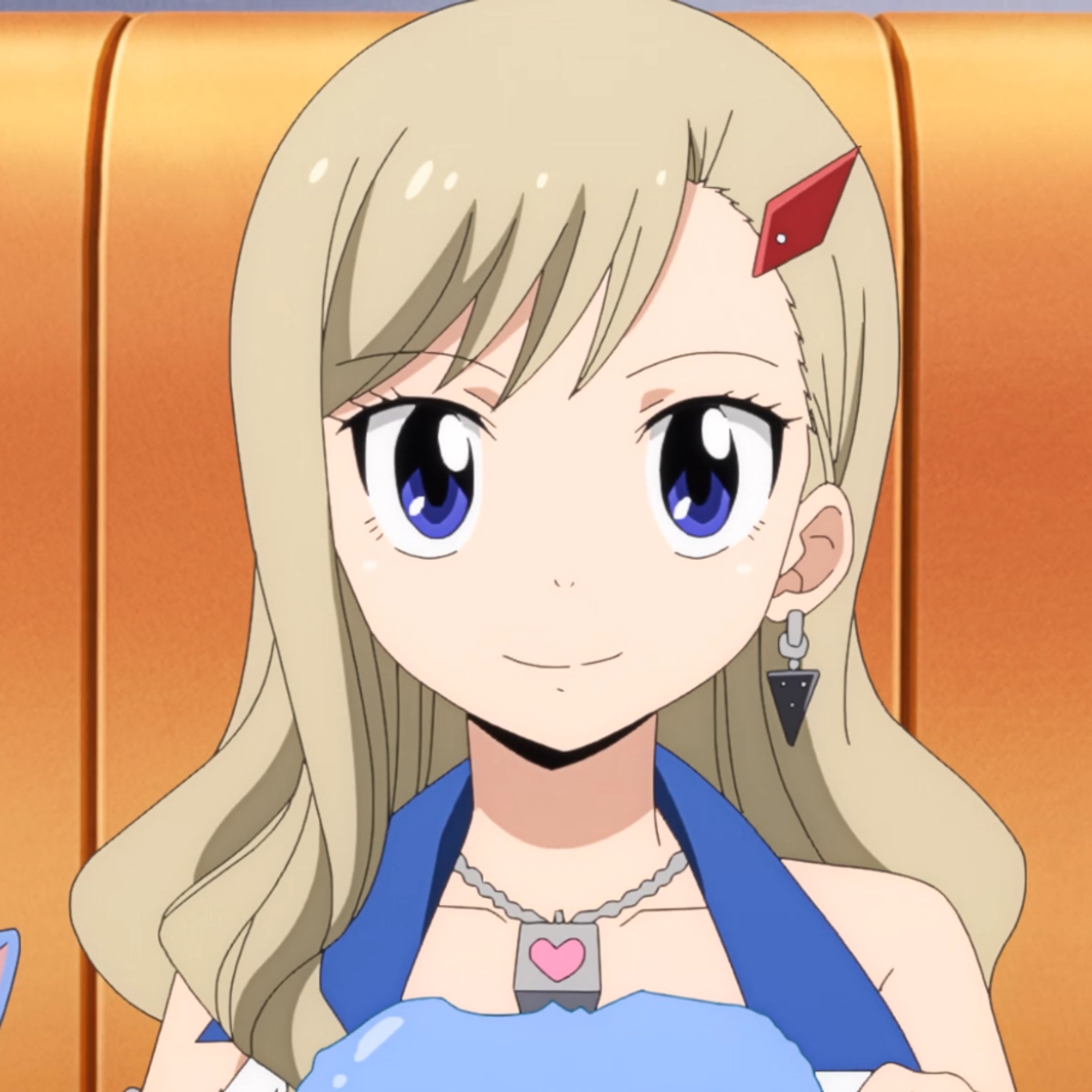 An anime-style character with ash-blonde hair and blue eyes, wearing a blue outfit with heart motifs.