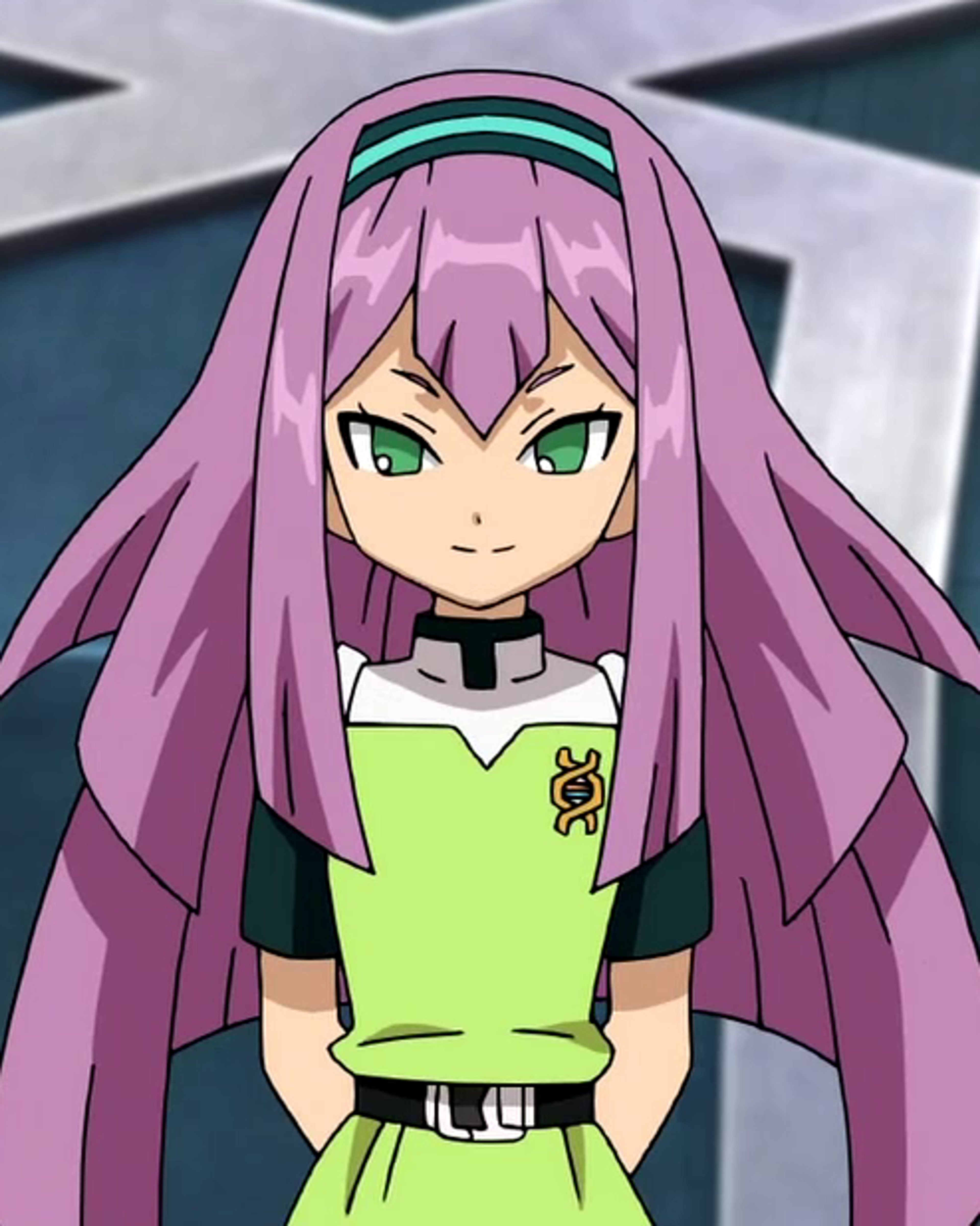 A young woman with long, dark lavender hair and green eyes wearing a green shirt and black belt.