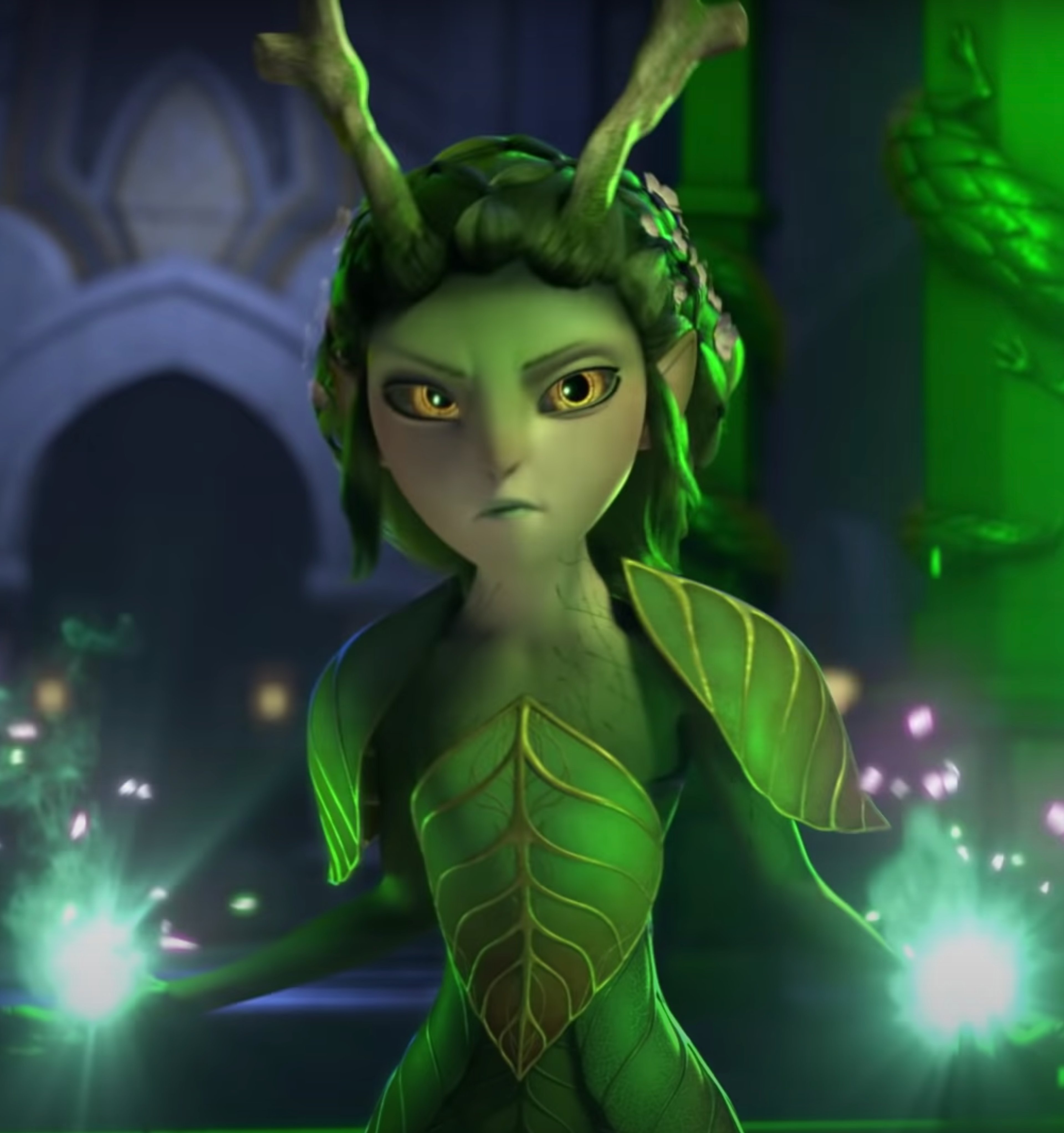 A green, plant-like humanoid character with antennae and a flowing, leaf-like dress