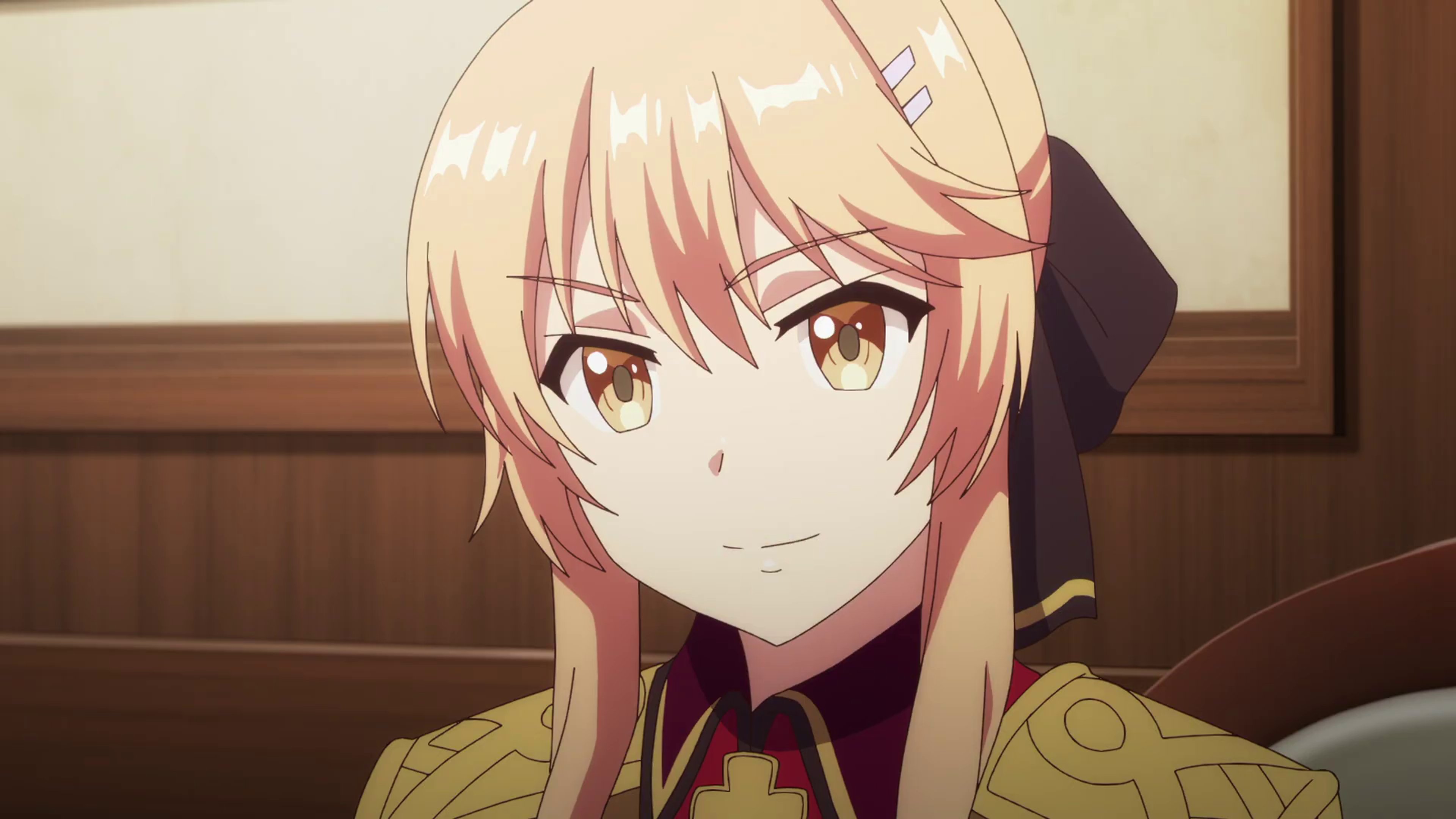 A young woman with platinum blonde hair and green eyes wearing a military-style uniform