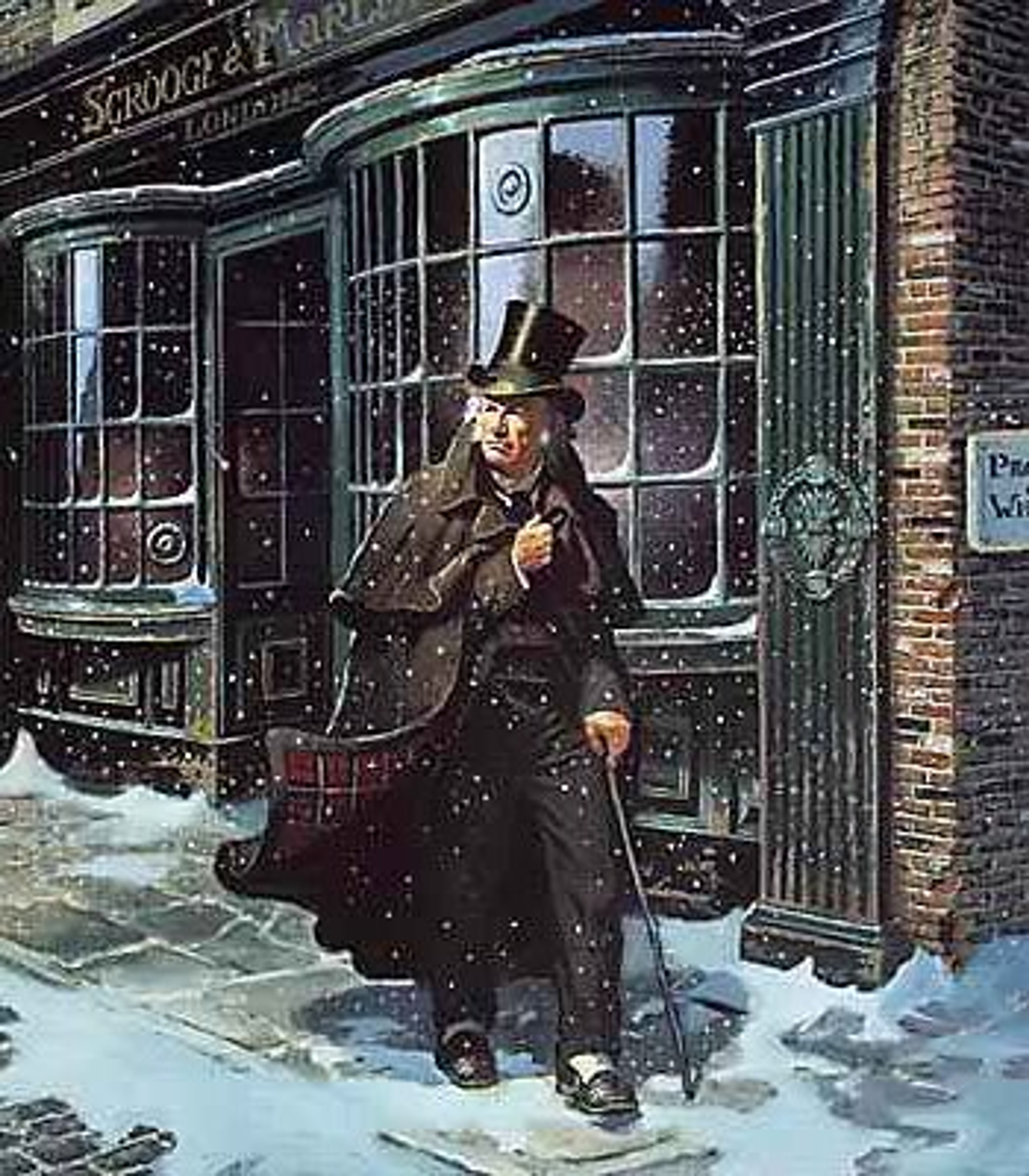 A man in a long dark coat and top hat standing in the snow outside a storefront