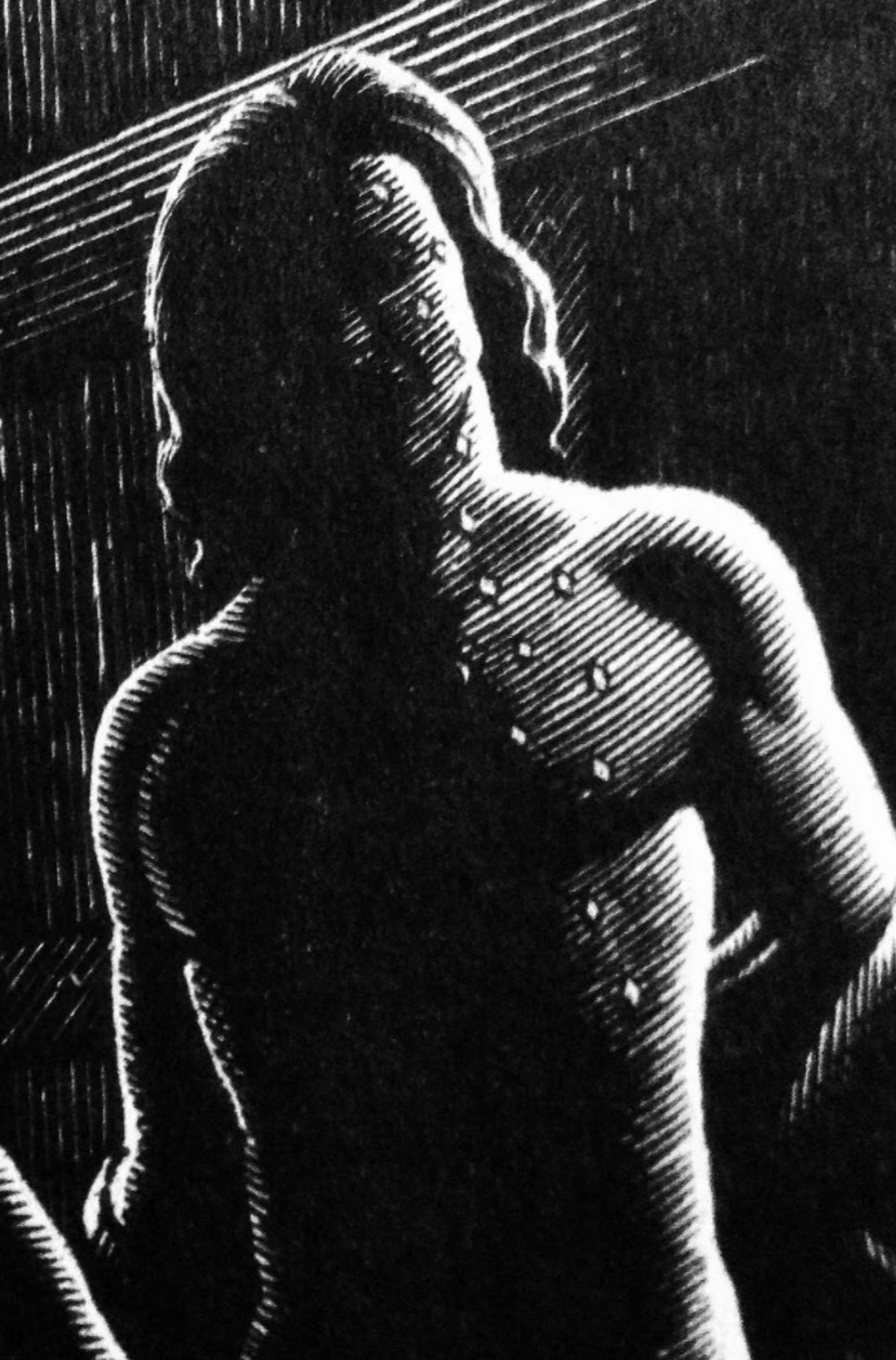 A shadowy, high-contrast silhouette of a muscular male figure.