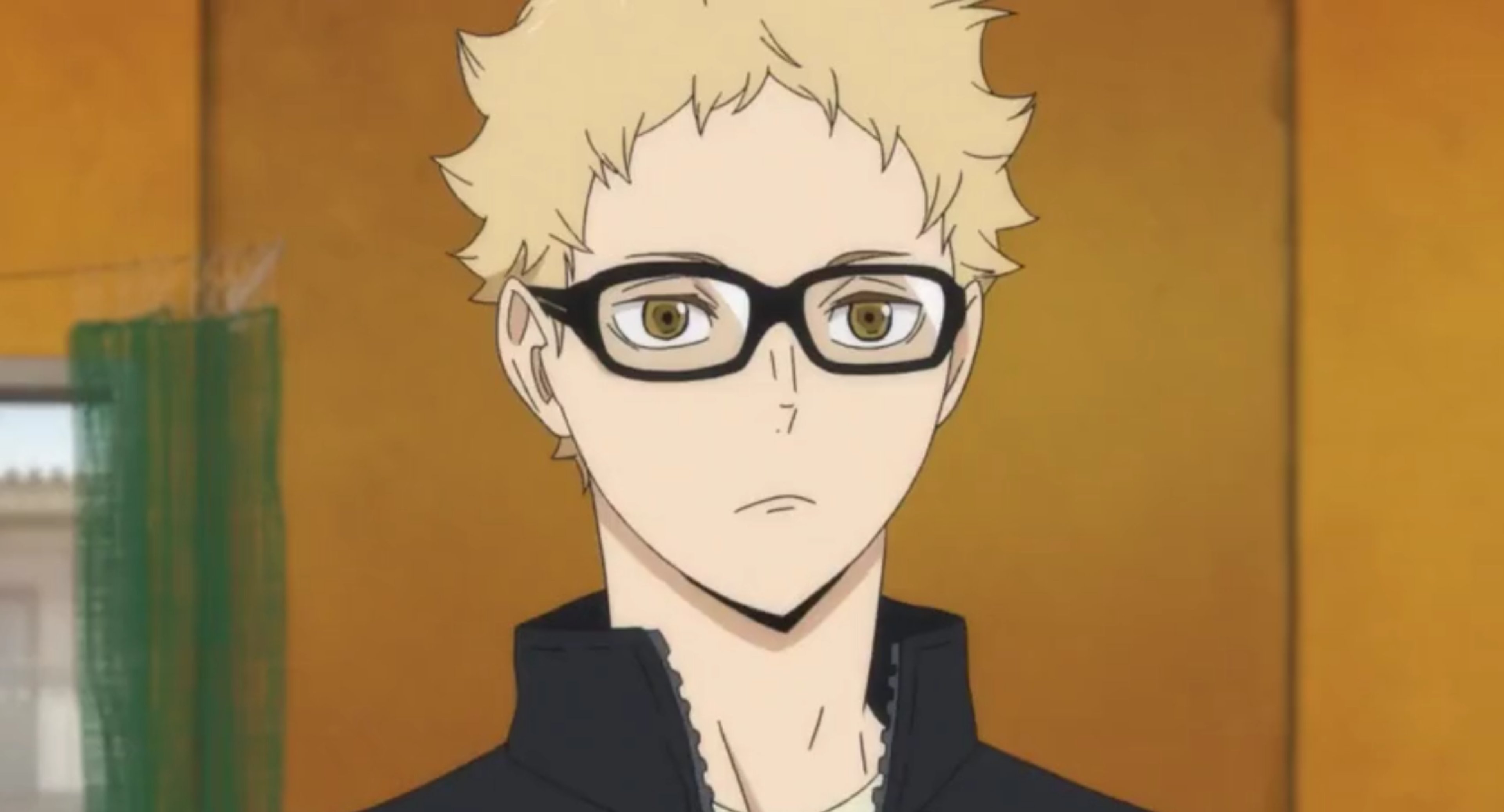 A young man with glasses and a cynical expression, wearing a school uniform.