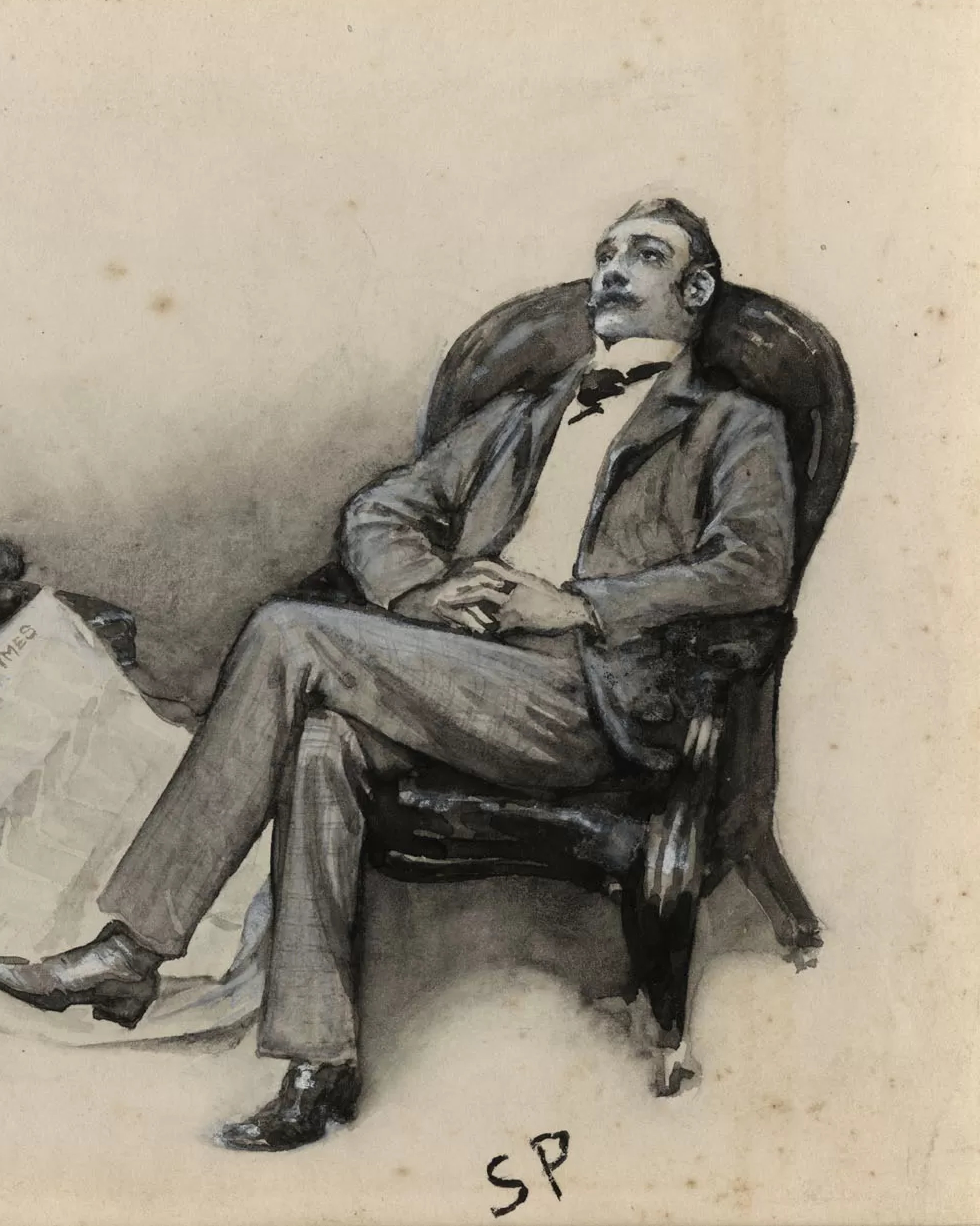 An older man in a suit sitting in a chair, with a serious expression on his face.