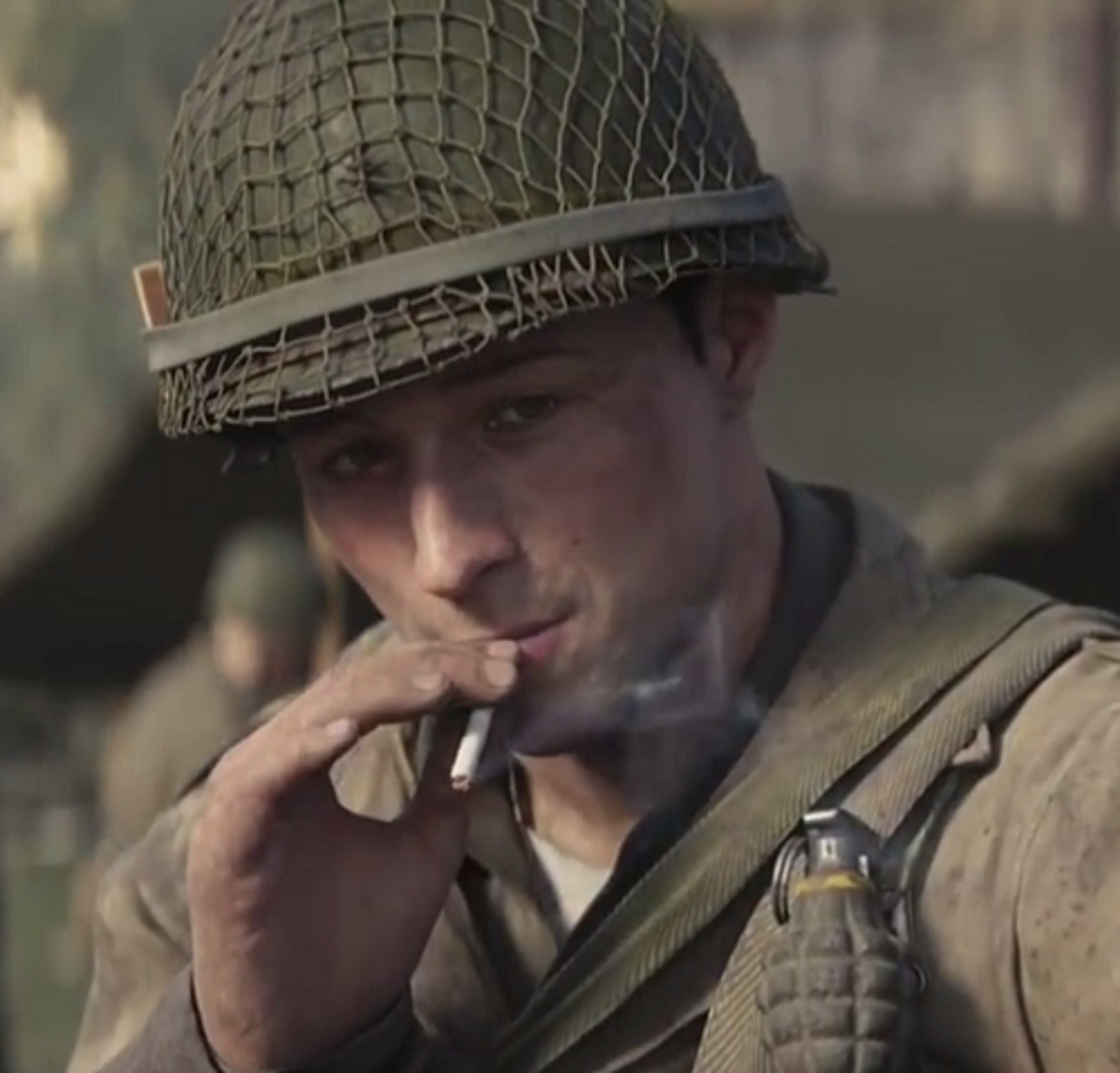 A World War II-era soldier with a serious expression, wearing a military helmet and uniform