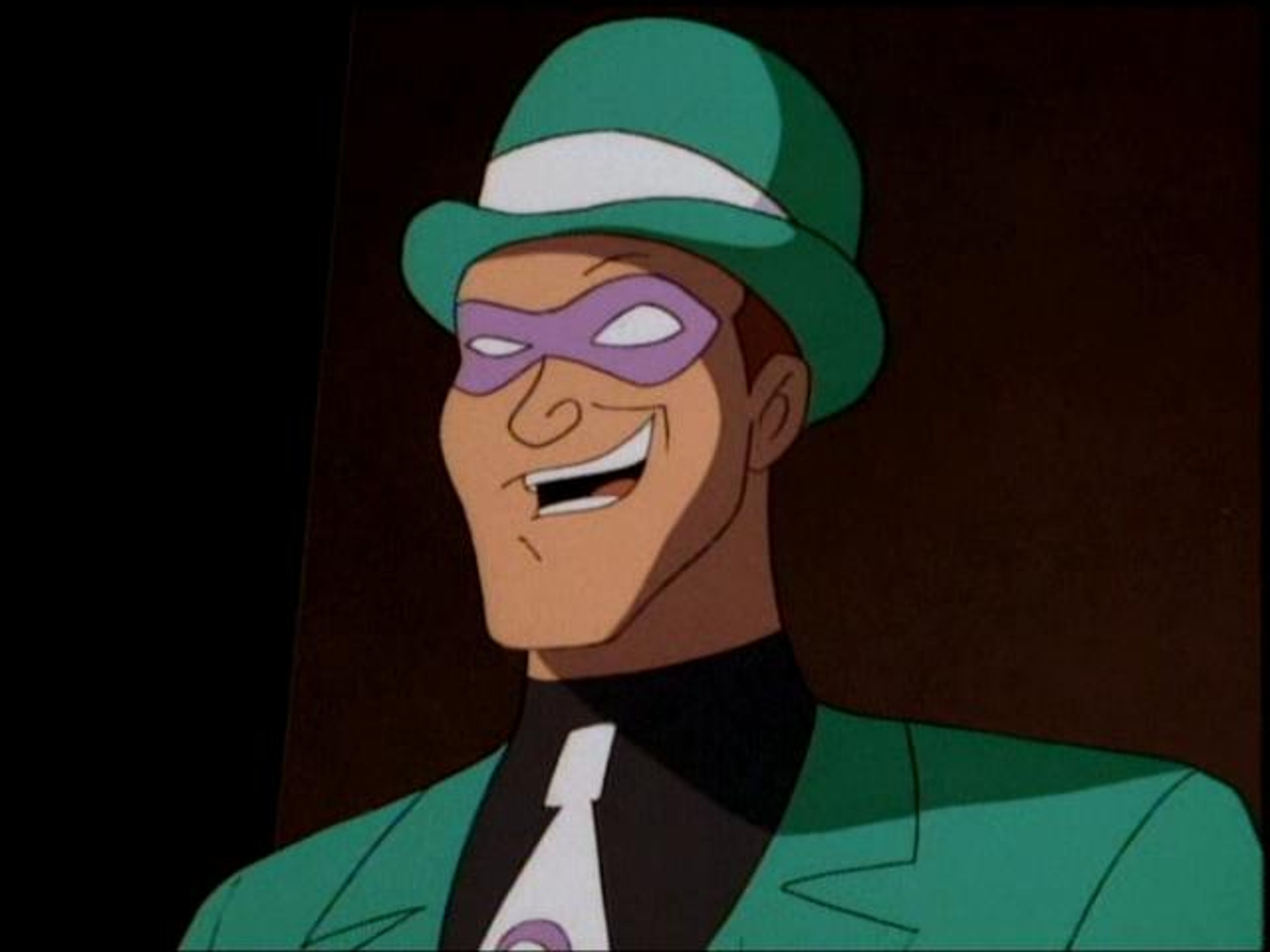 A cartoon character in a green hat and purple suit, with a mischievous expression on his face.
