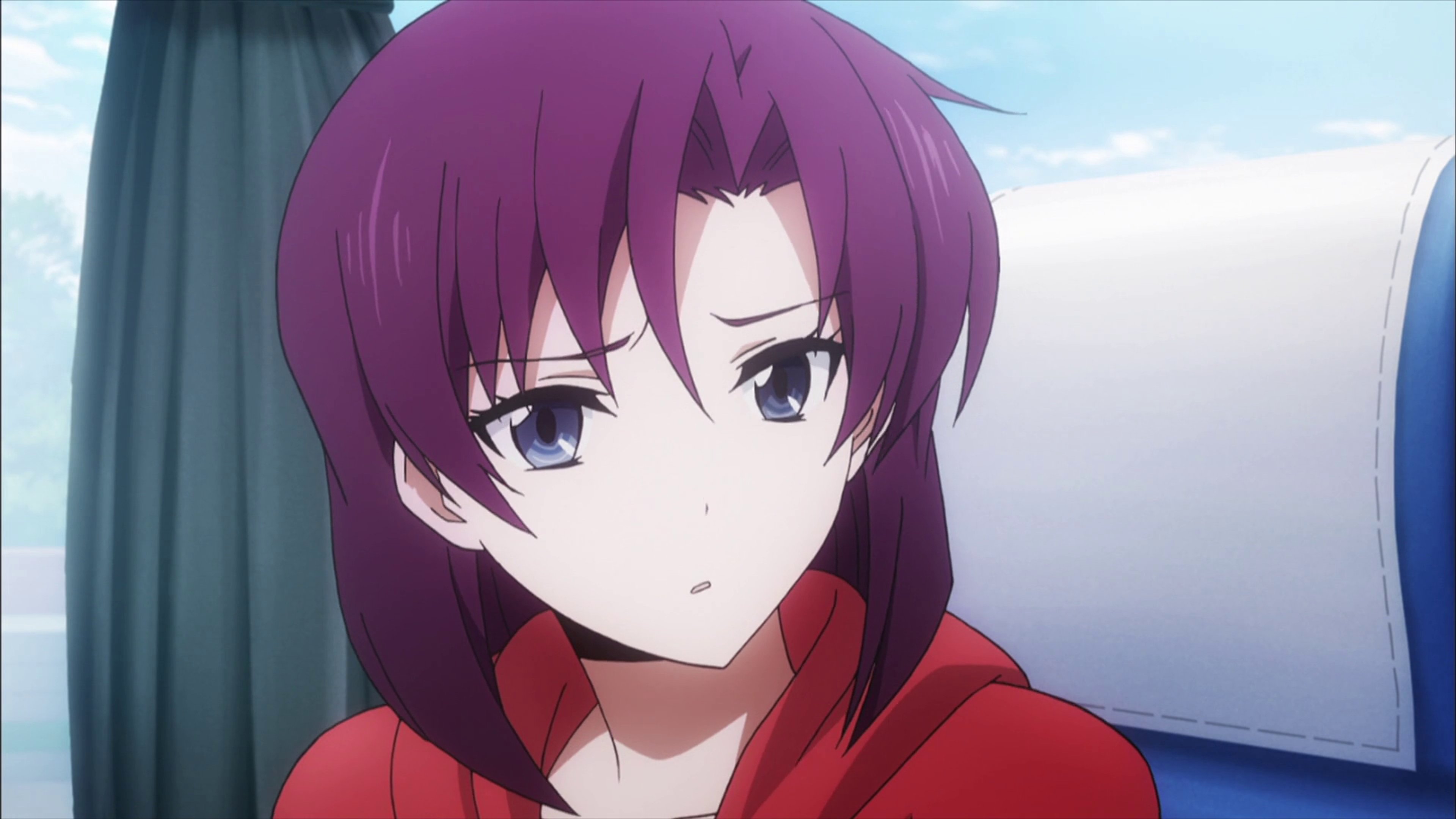 A young woman with short purple hair and blue-gray eyes wearing a red jacket