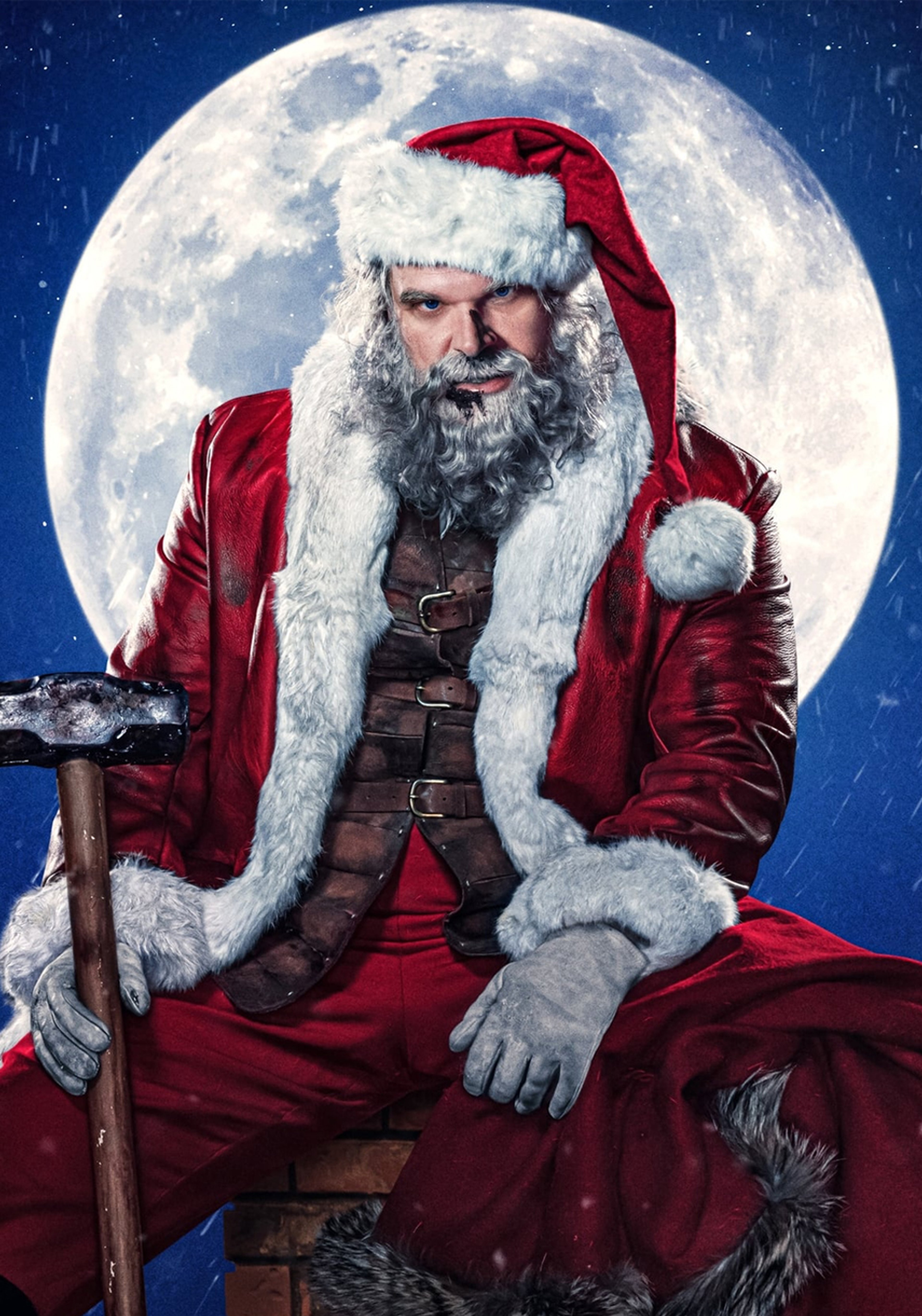 An elderly man dressed as Santa Claus, sitting on a throne with a full moon in the night sky behind him.