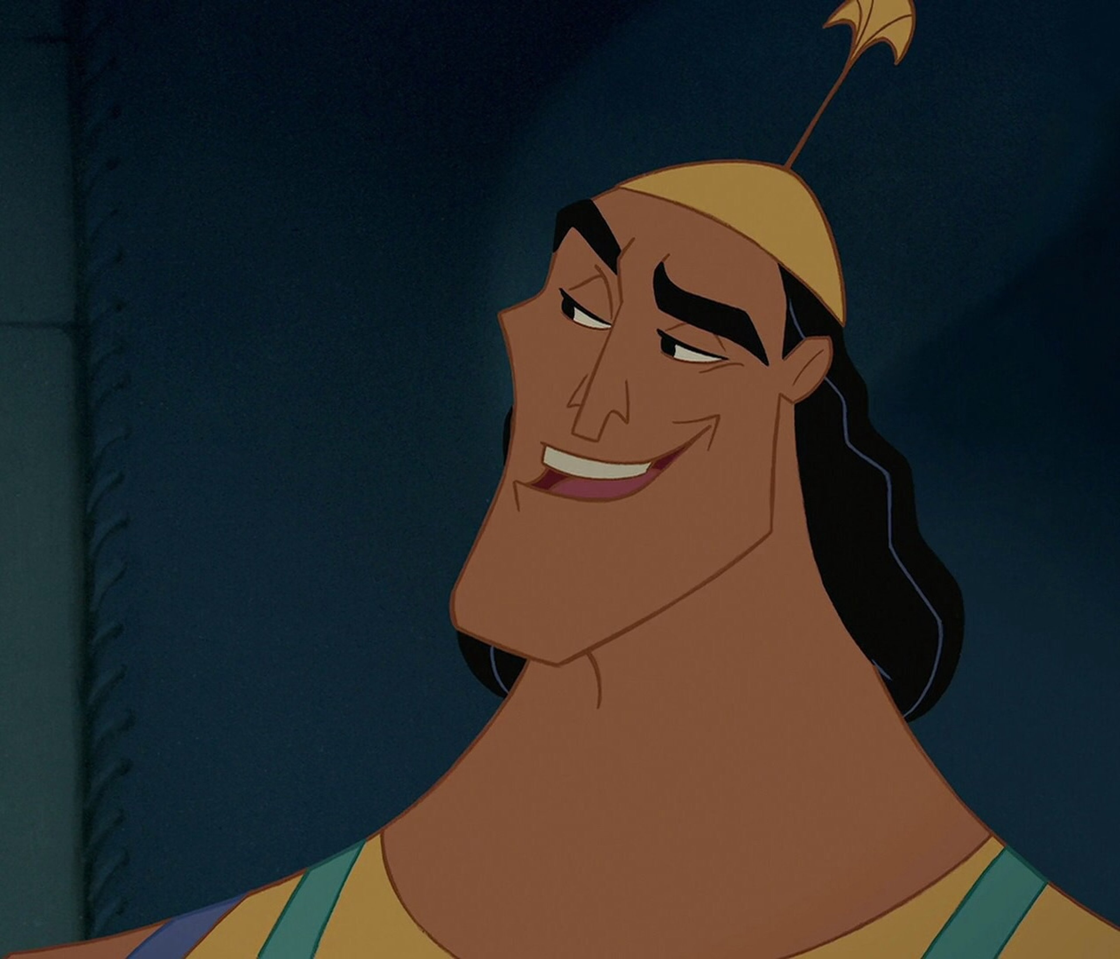 An animated male character with a muscular build and friendly expression, wearing a yellow tunic.