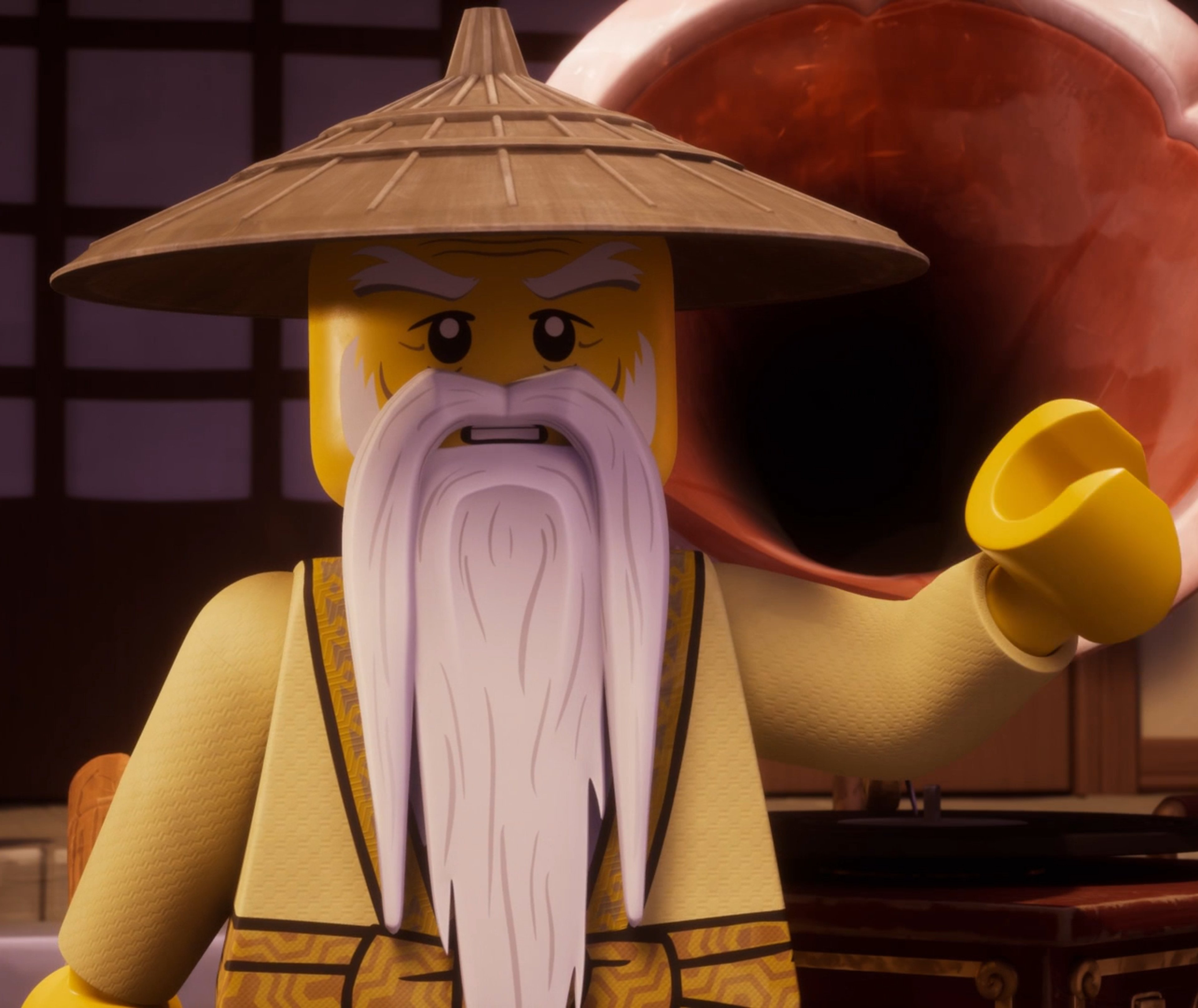 An elderly Asian man with a long white beard, wearing traditional robes and a conical hat, holding a bamboo staff.