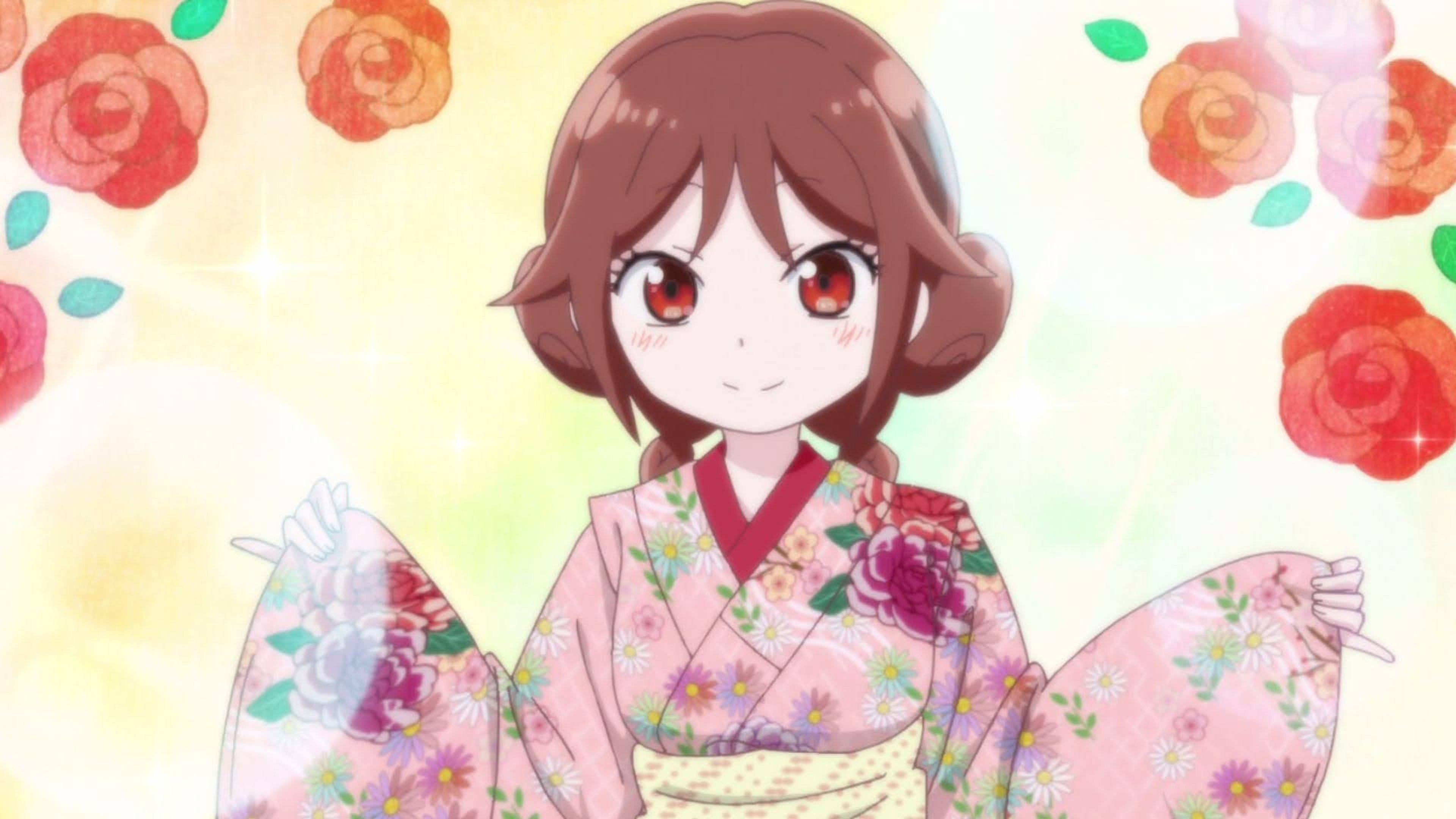 A young woman with braided hair wearing a colorful kimono