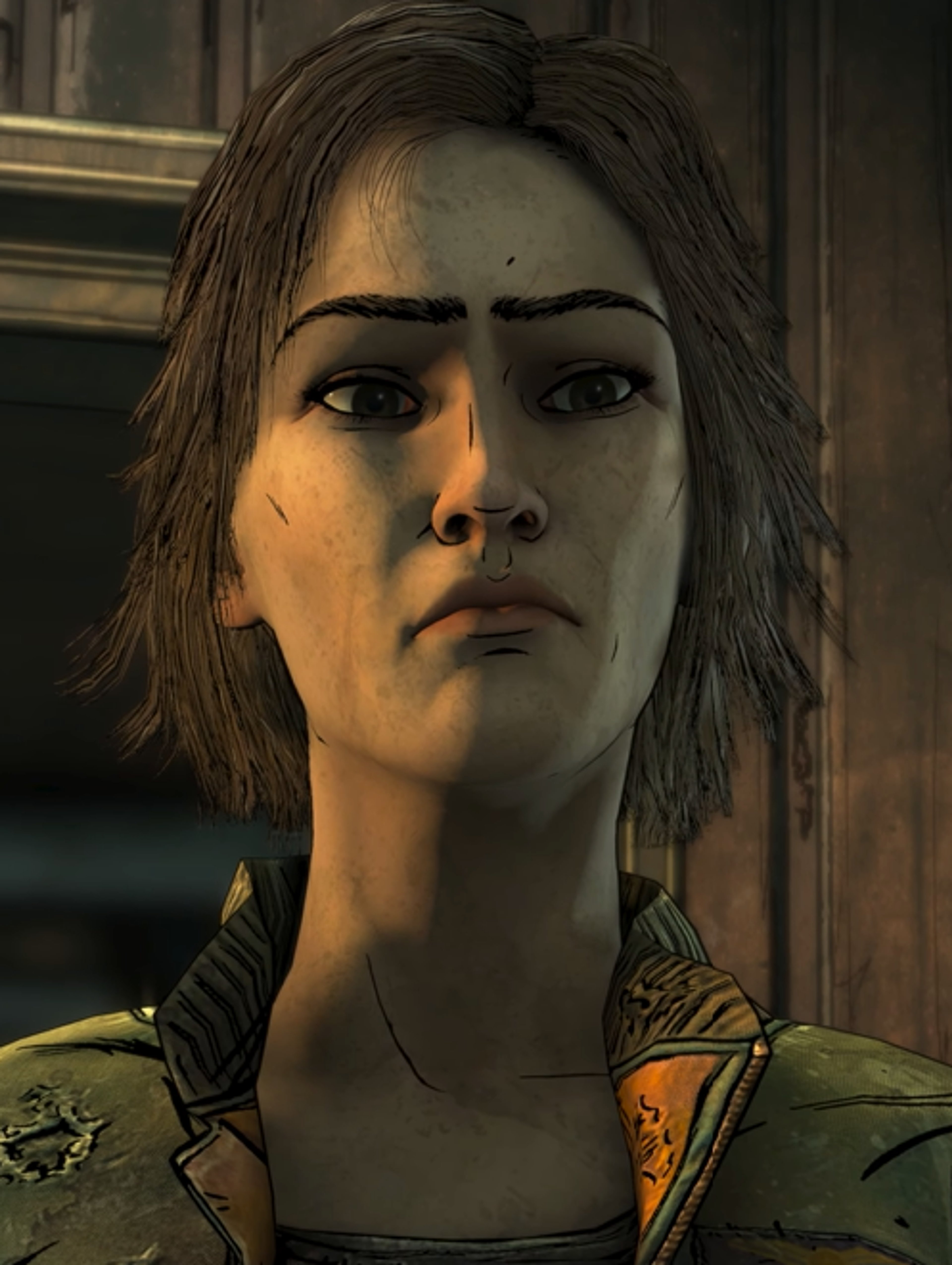 A woman with a serious expression wearing a military-style jacket in a post-apocalyptic setting.