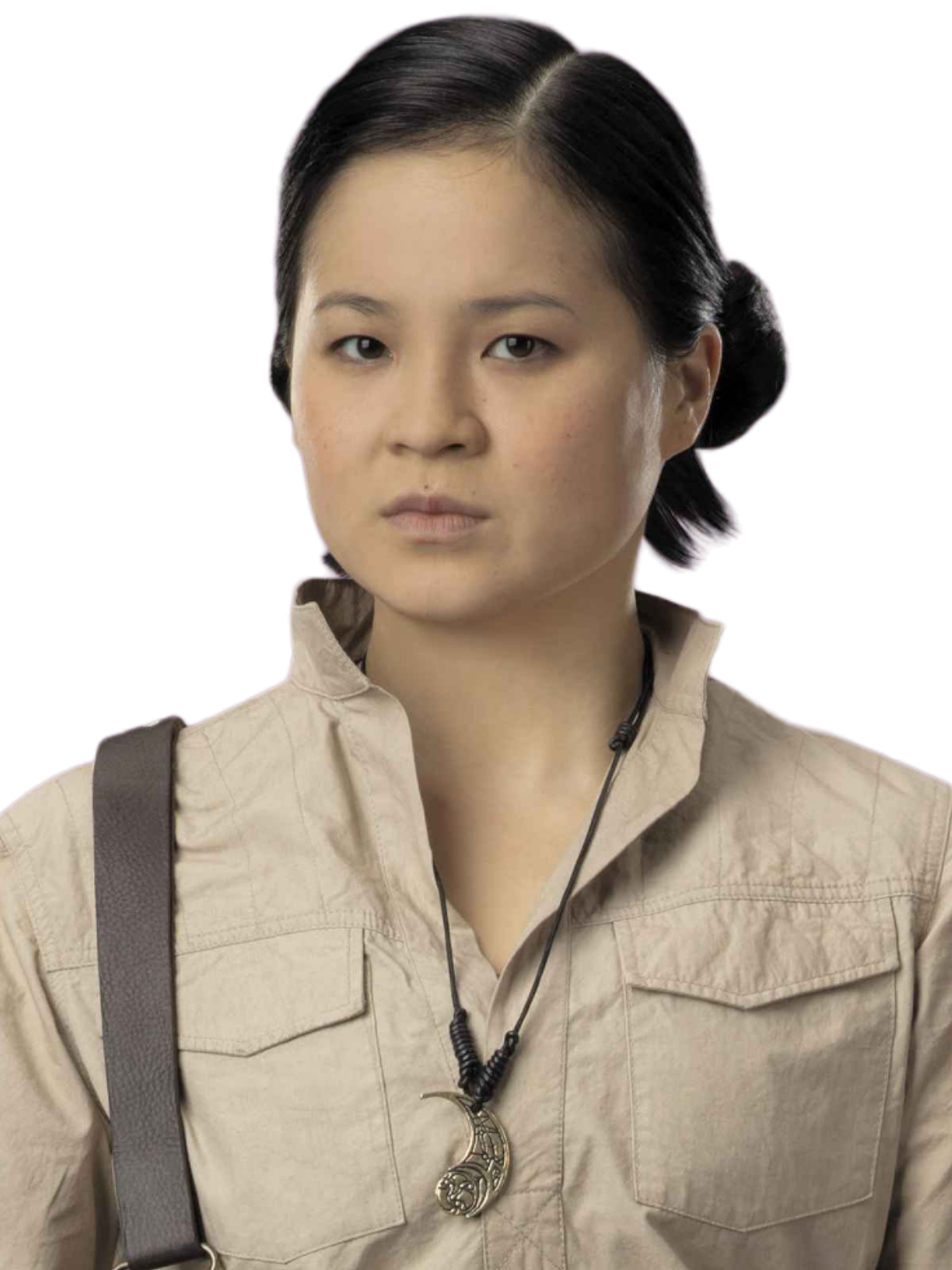 A young Asian woman with dark hair wearing a tan jacket, looking serious and determined.