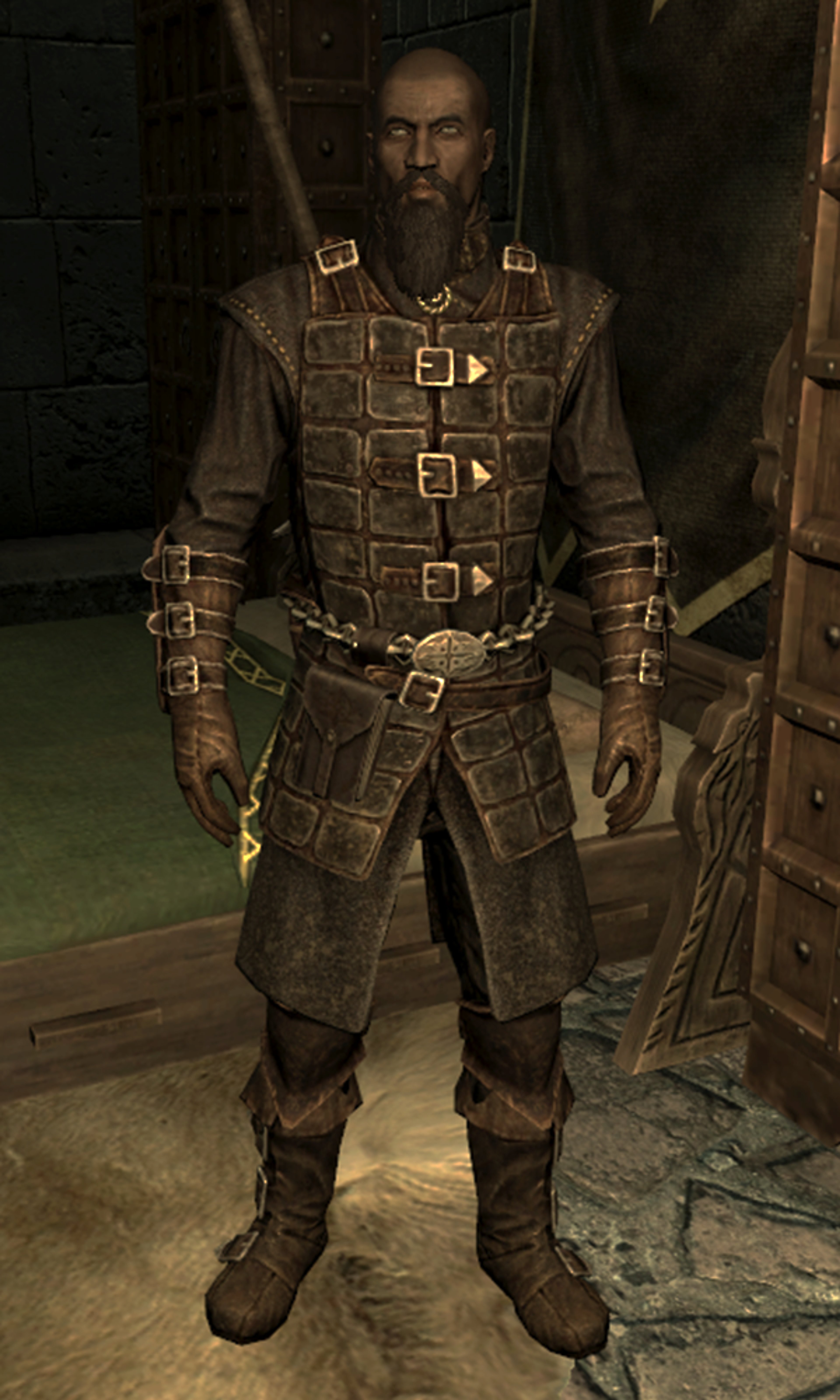 A rugged, heavily armored Redguard man with a stern expression