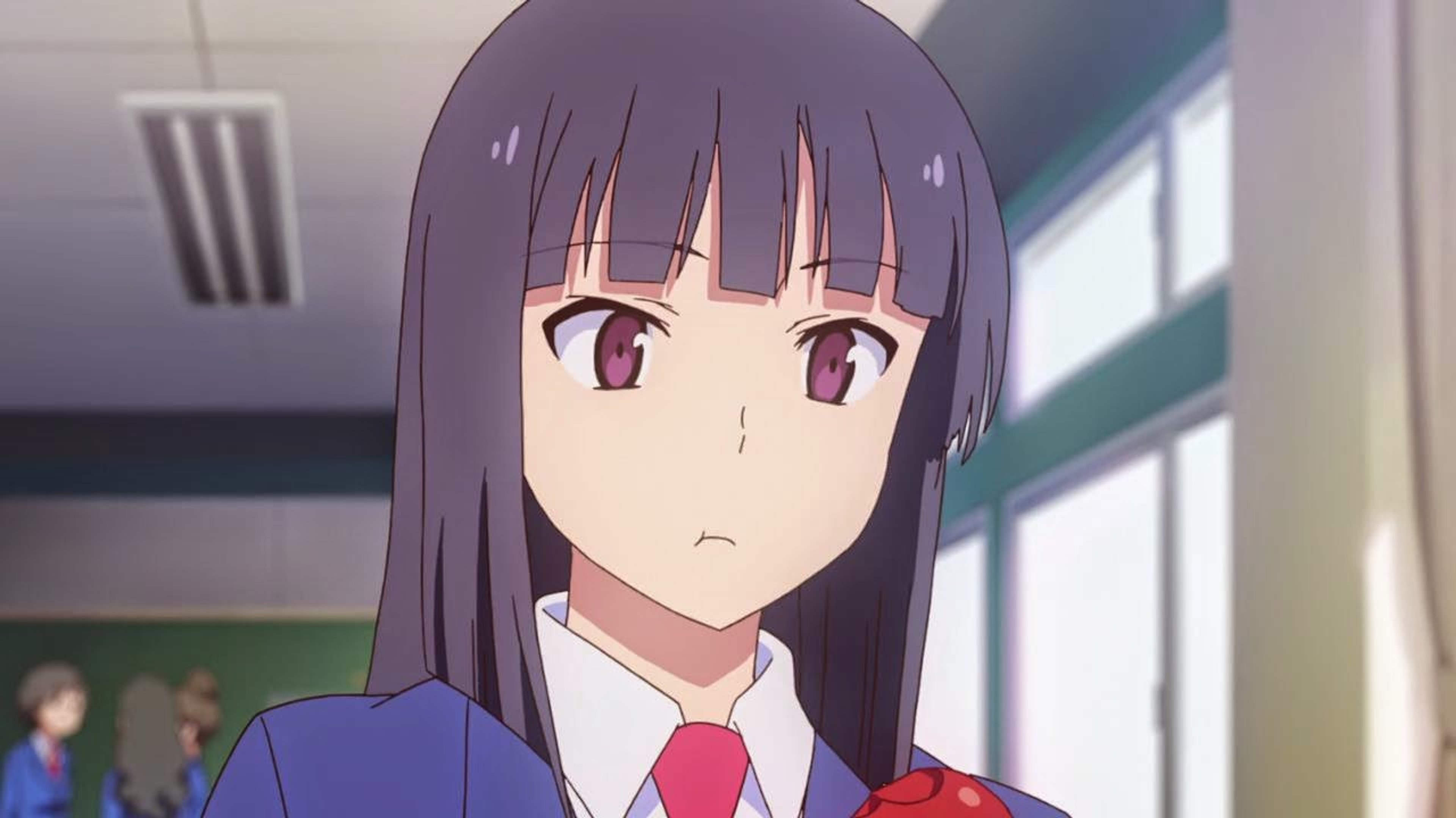 A young, feminine-looking character with long dark hair and reddish-maroon eyes wearing a school uniform with a red tie.