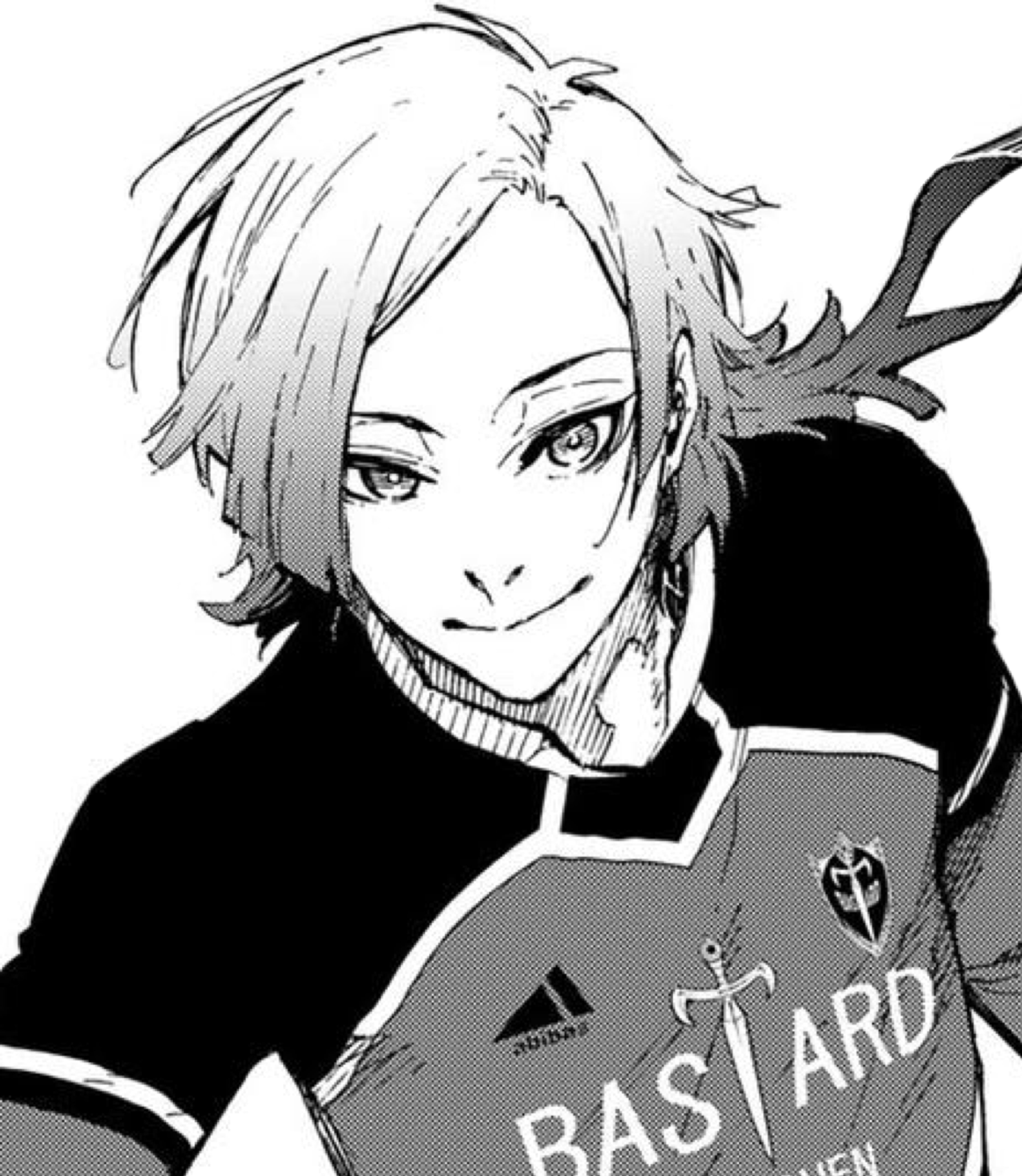 A young, arrogant-looking soccer player with blonde hair and blue streaks, wearing a black jersey with 'BASTARD' printed on it.