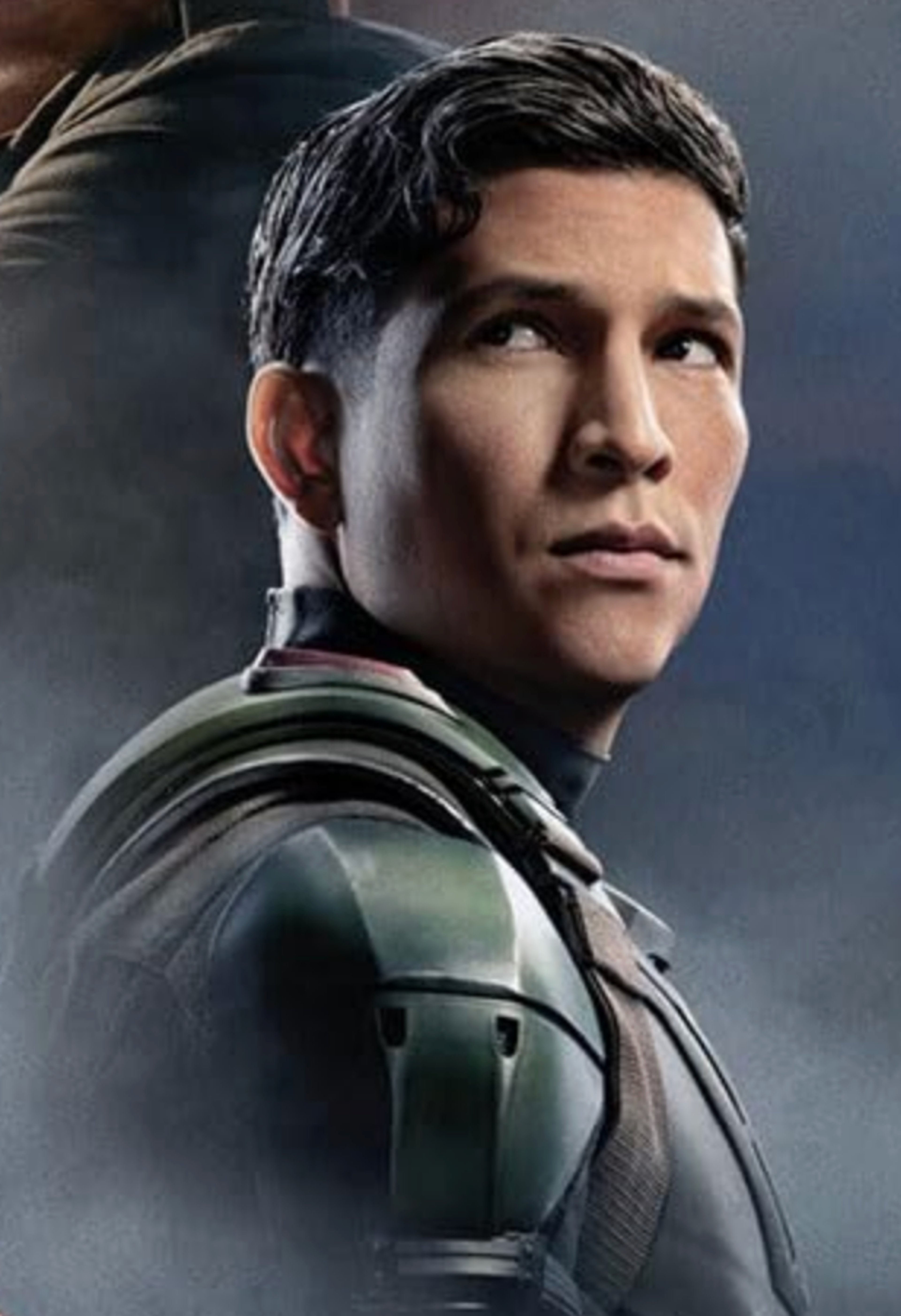 A portrait of a young military intelligence officer with short dark hair and a serious expression.